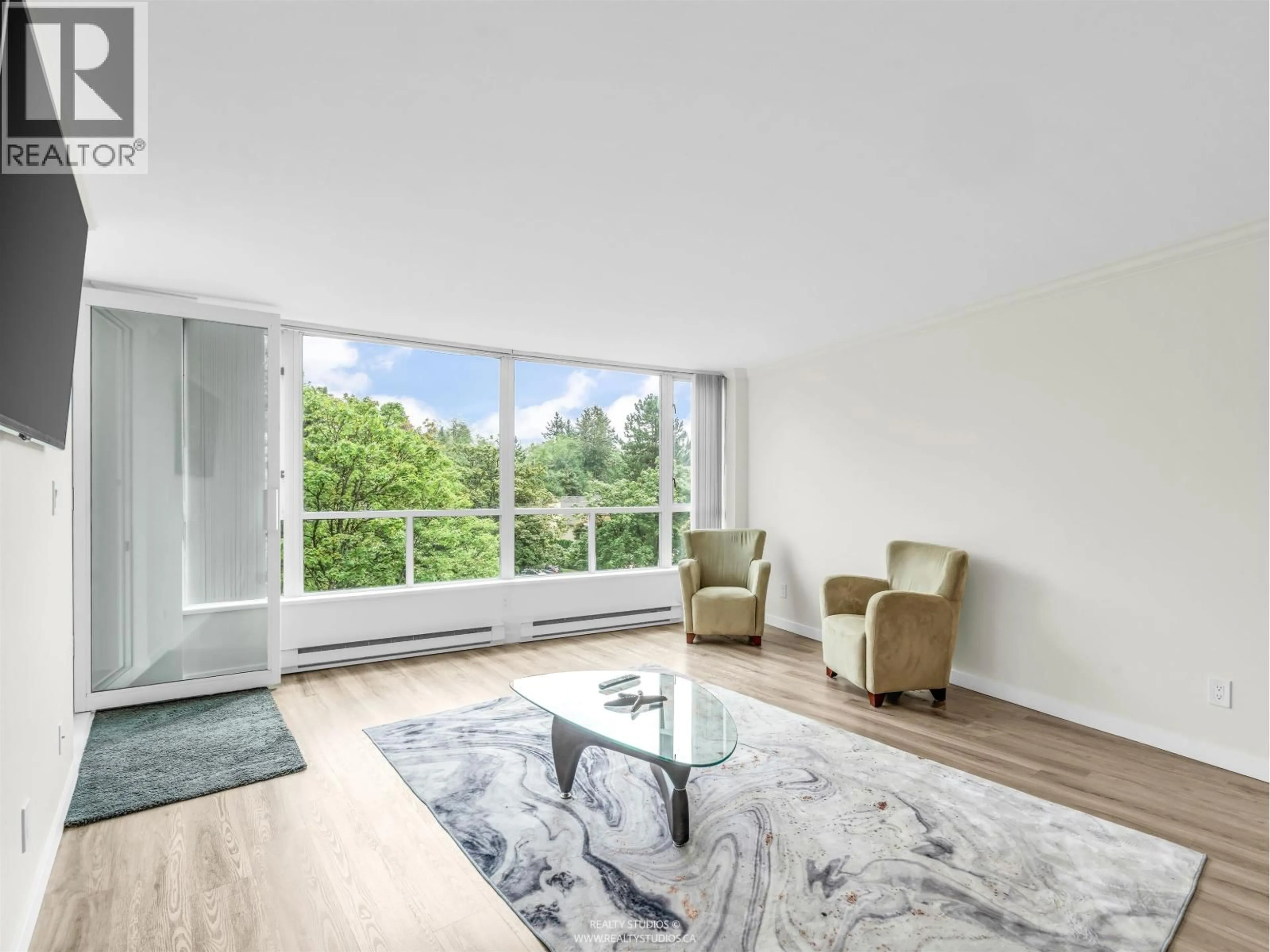 Living room with furniture, unknown for 406 - 995 ROCHE POINT DRIVE, North Vancouver British Columbia V7H2X4