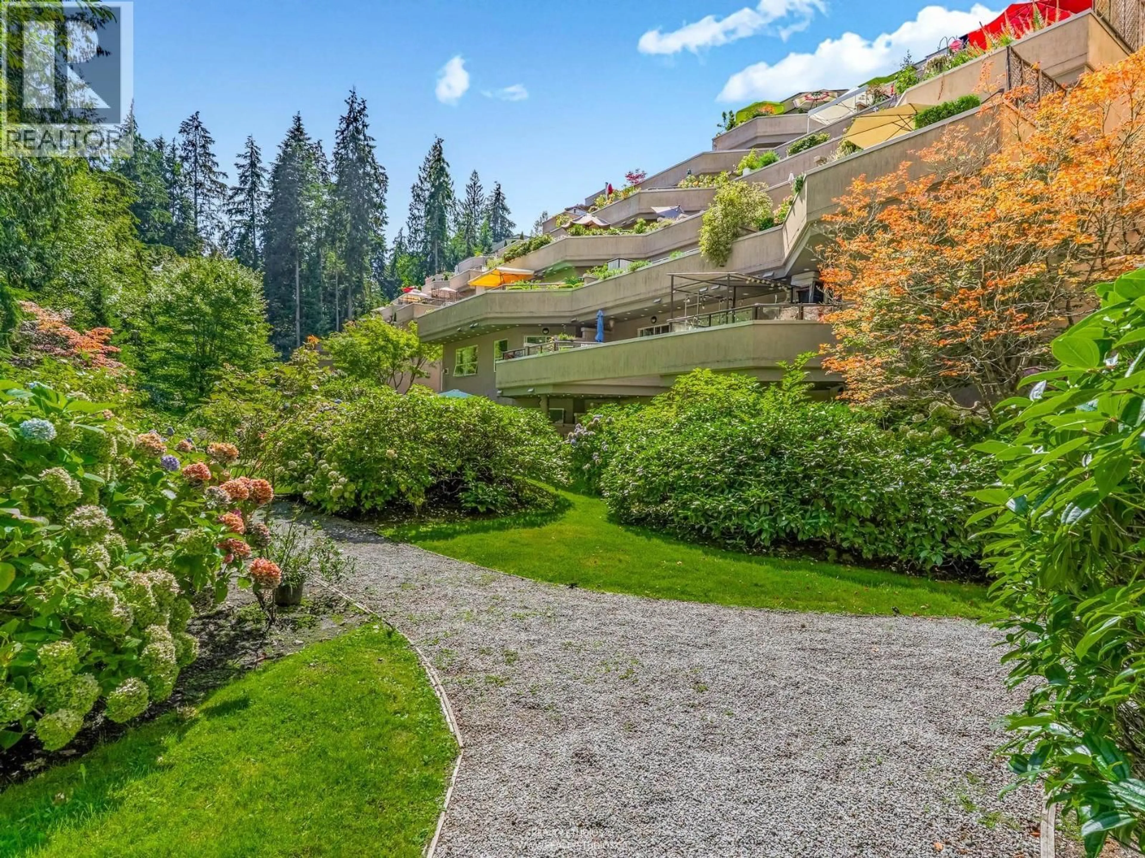 A pic from outside/outdoor area/front of a property/back of a property/a pic from drone, mountain view for 305 - 1500 OSTLER COURT, North Vancouver British Columbia V7G2S2
