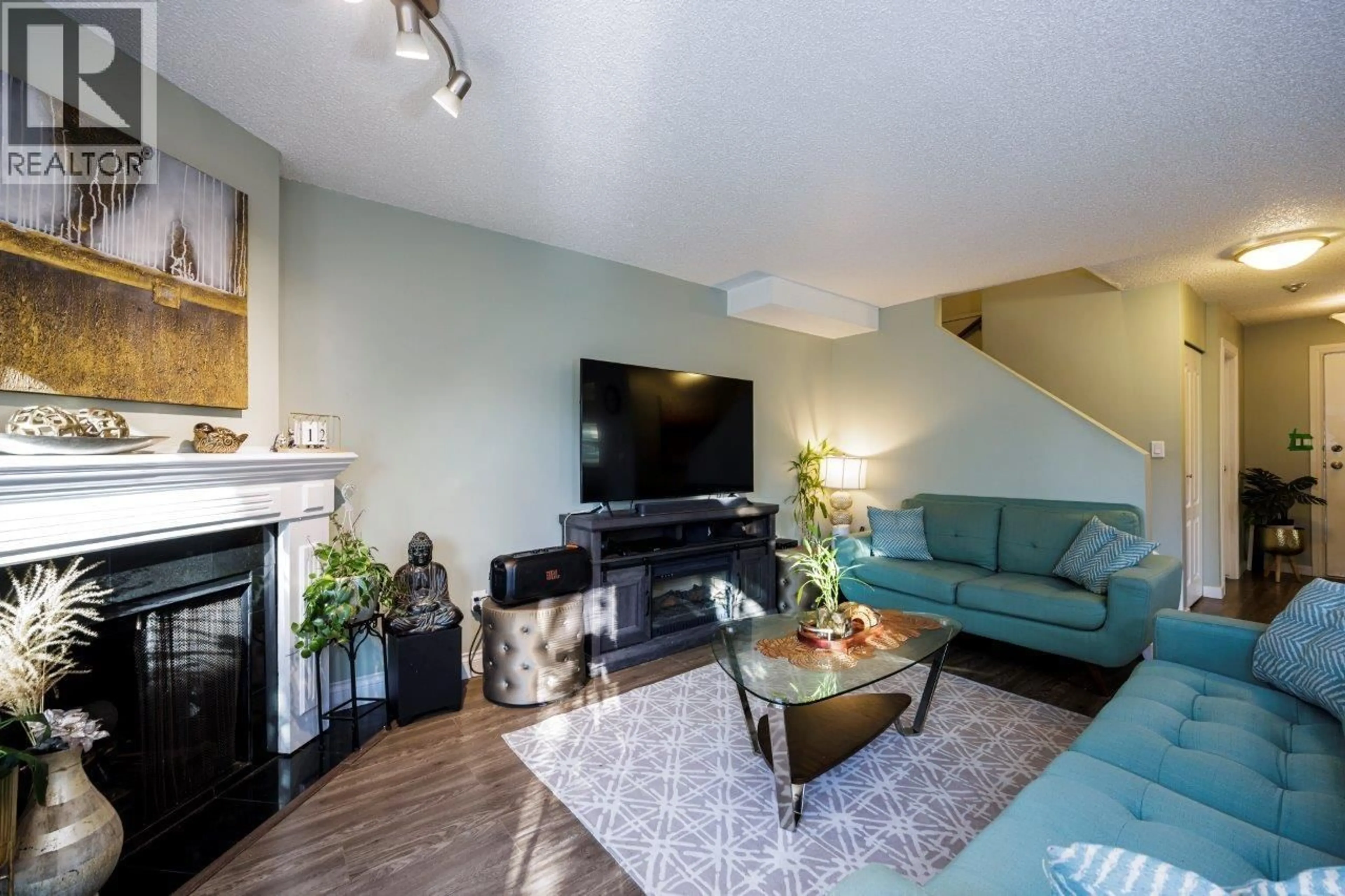 Living room with furniture, wood/laminate floor for 3340 MARQUETTE CRESCENT, Vancouver British Columbia V5S4K4