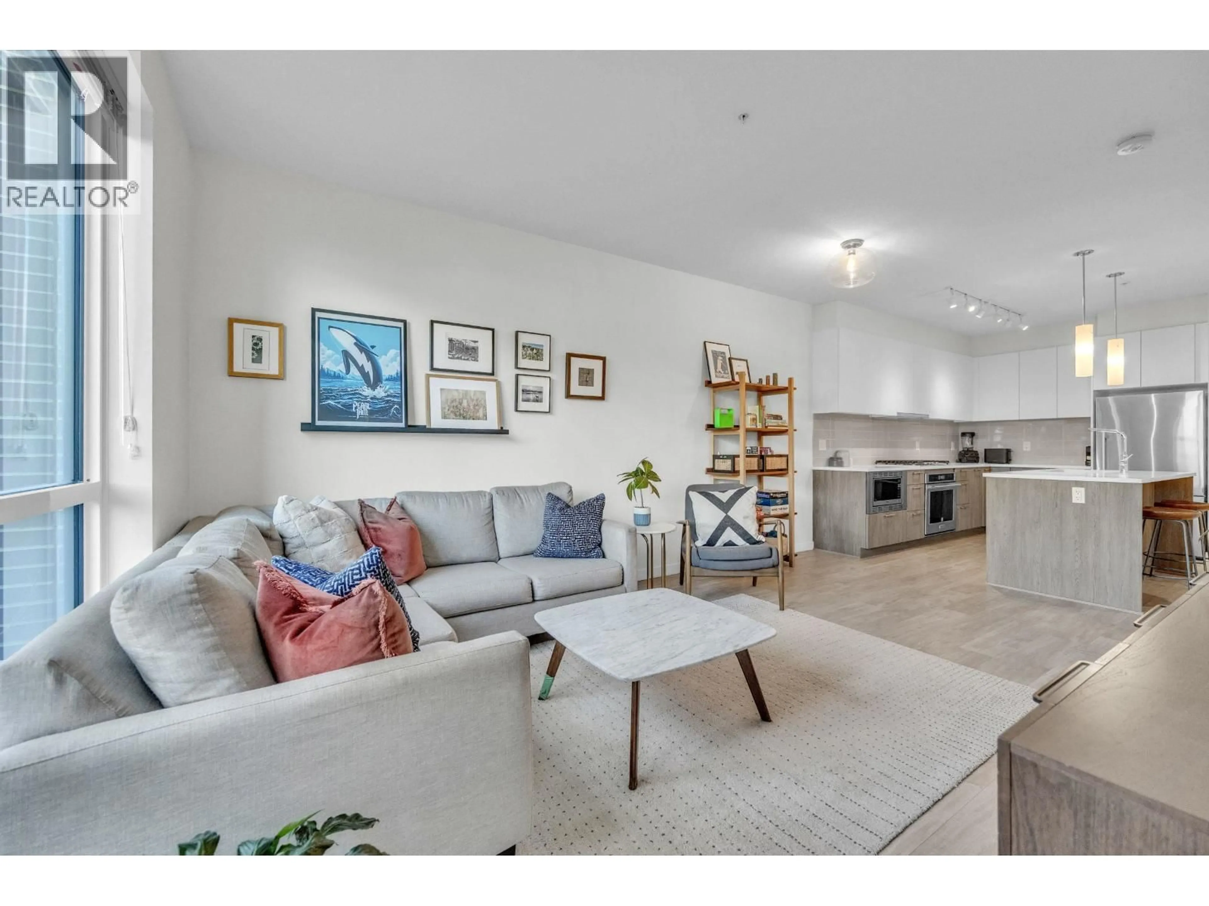 Living room with furniture, unknown for 108 - 615 3RD STREET, North Vancouver British Columbia V7L0G3