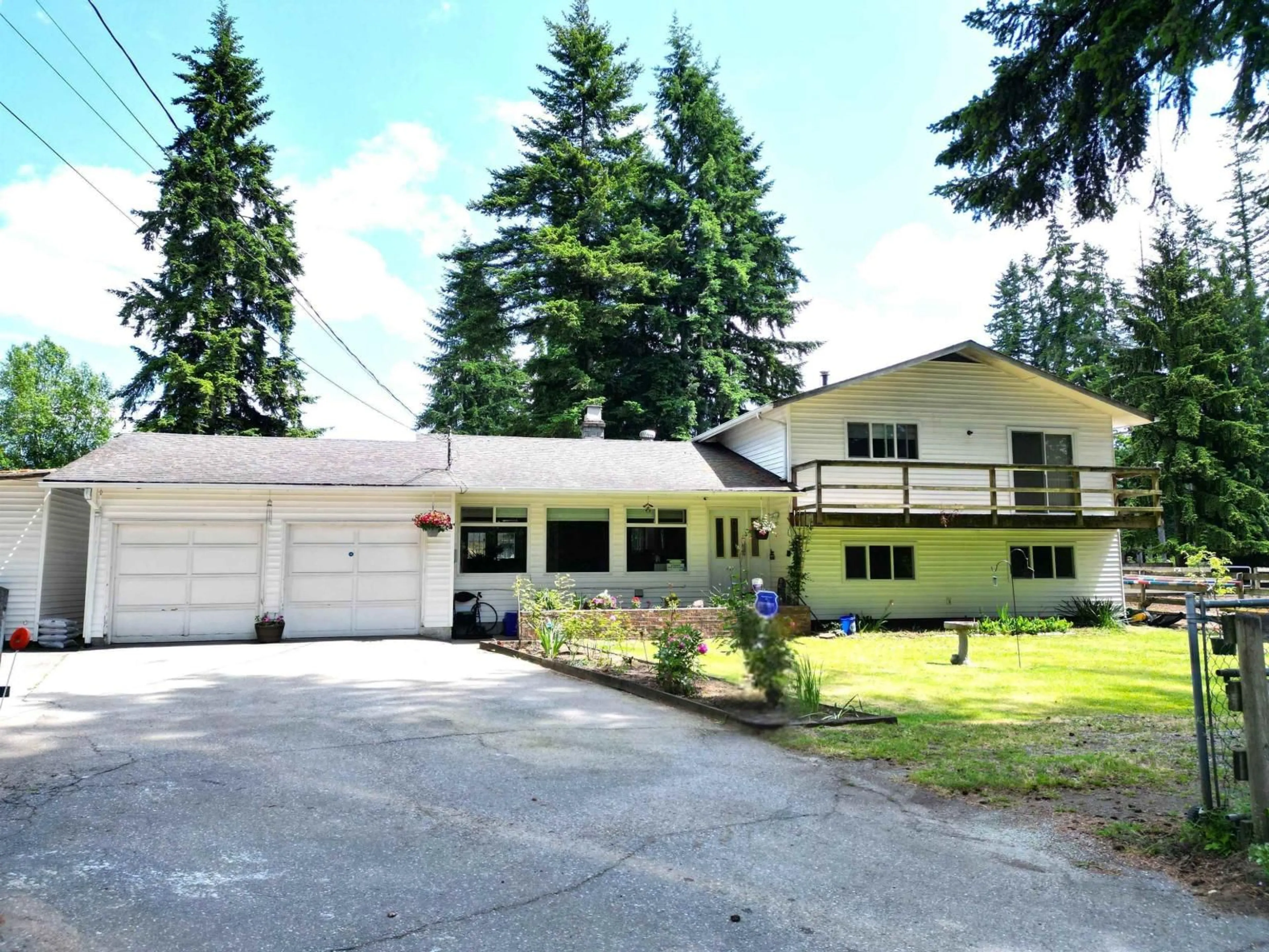 Home with vinyl exterior material, street for 5638 248 STREET, Langley British Columbia V4W1B7