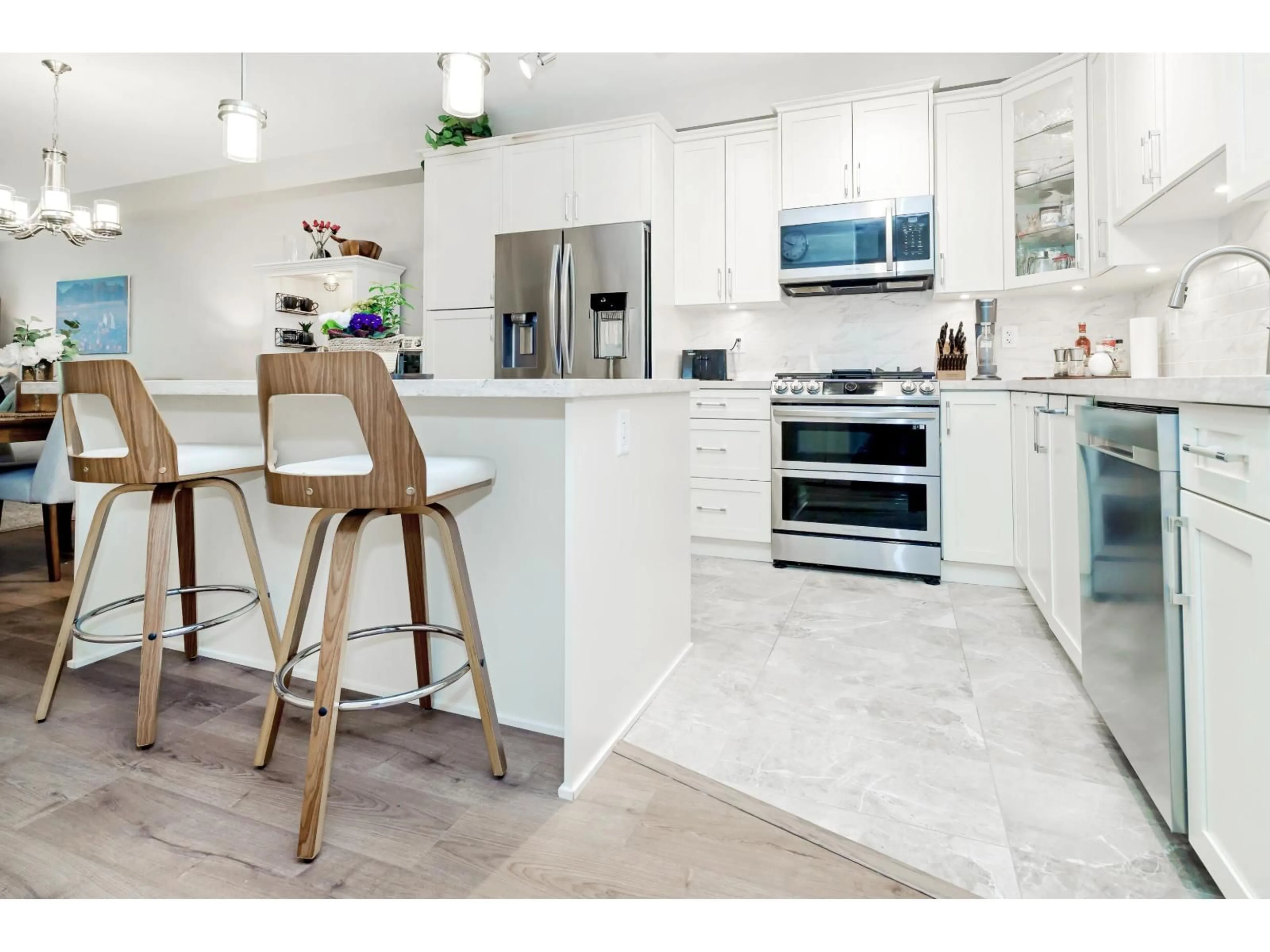 Open concept kitchen, ceramic/tile floor for 104 - 8538 203A STREET, Langley British Columbia V2Y3P9