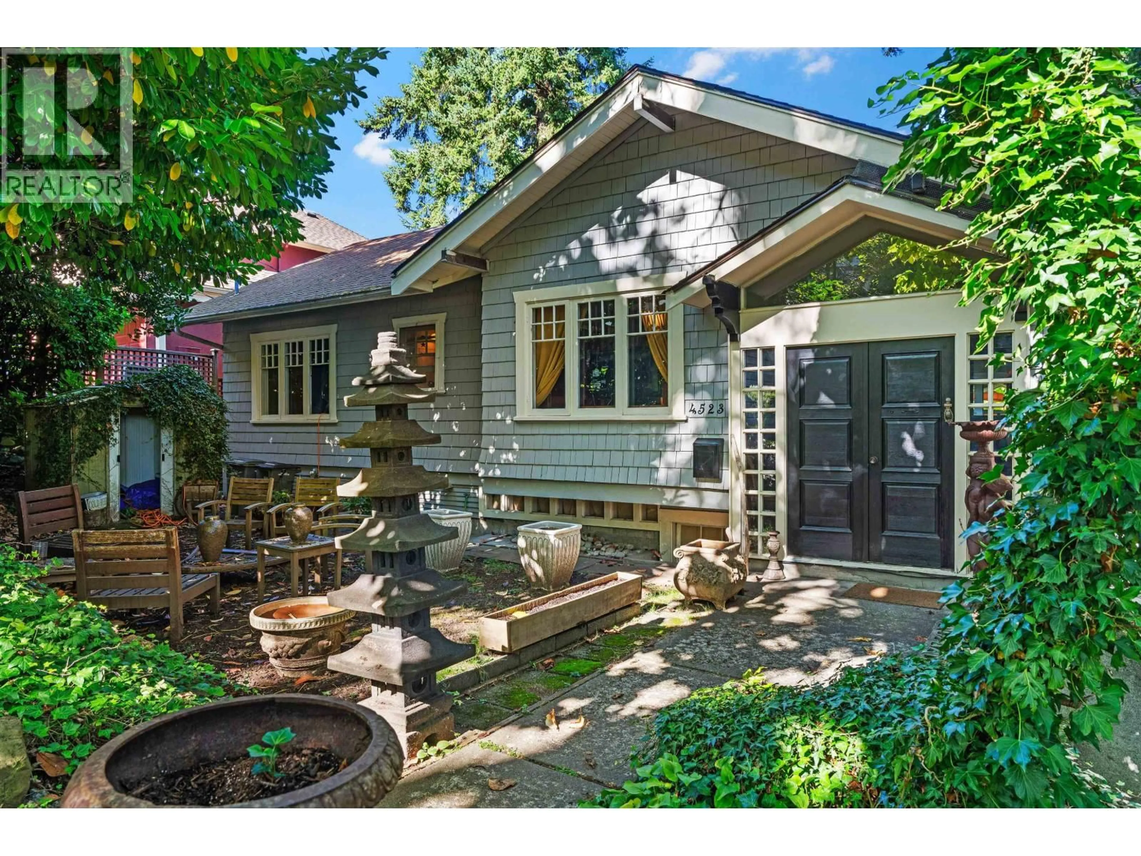 Home with brick exterior material, street for 4523 1ST AVENUE, Vancouver British Columbia V6R1H7