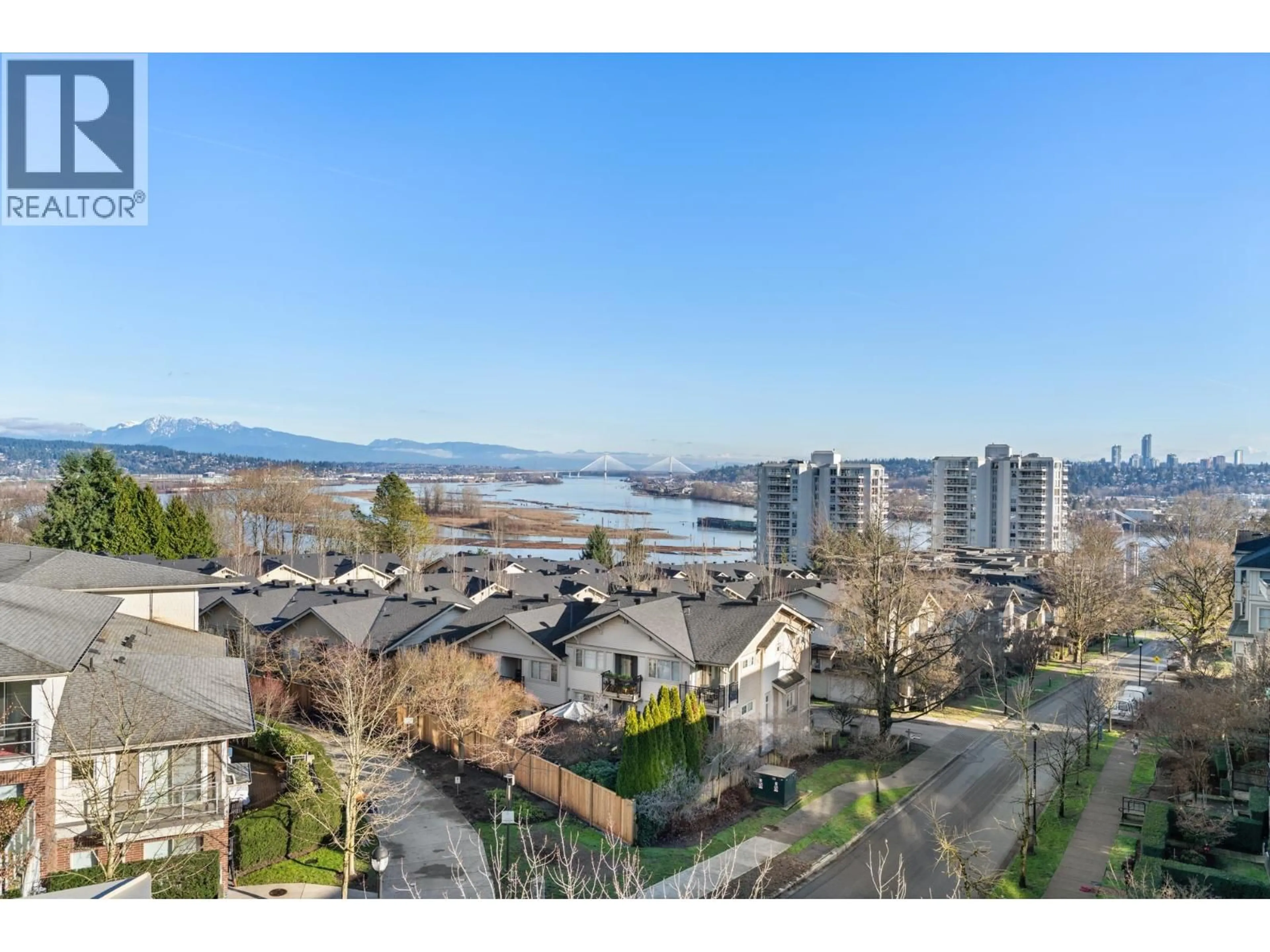 A pic from outside/outdoor area/front of a property/back of a property/a pic from drone, water/lake/river/ocean view for 404 - 270 FRANCIS WAY, New Westminster British Columbia V3L0C3