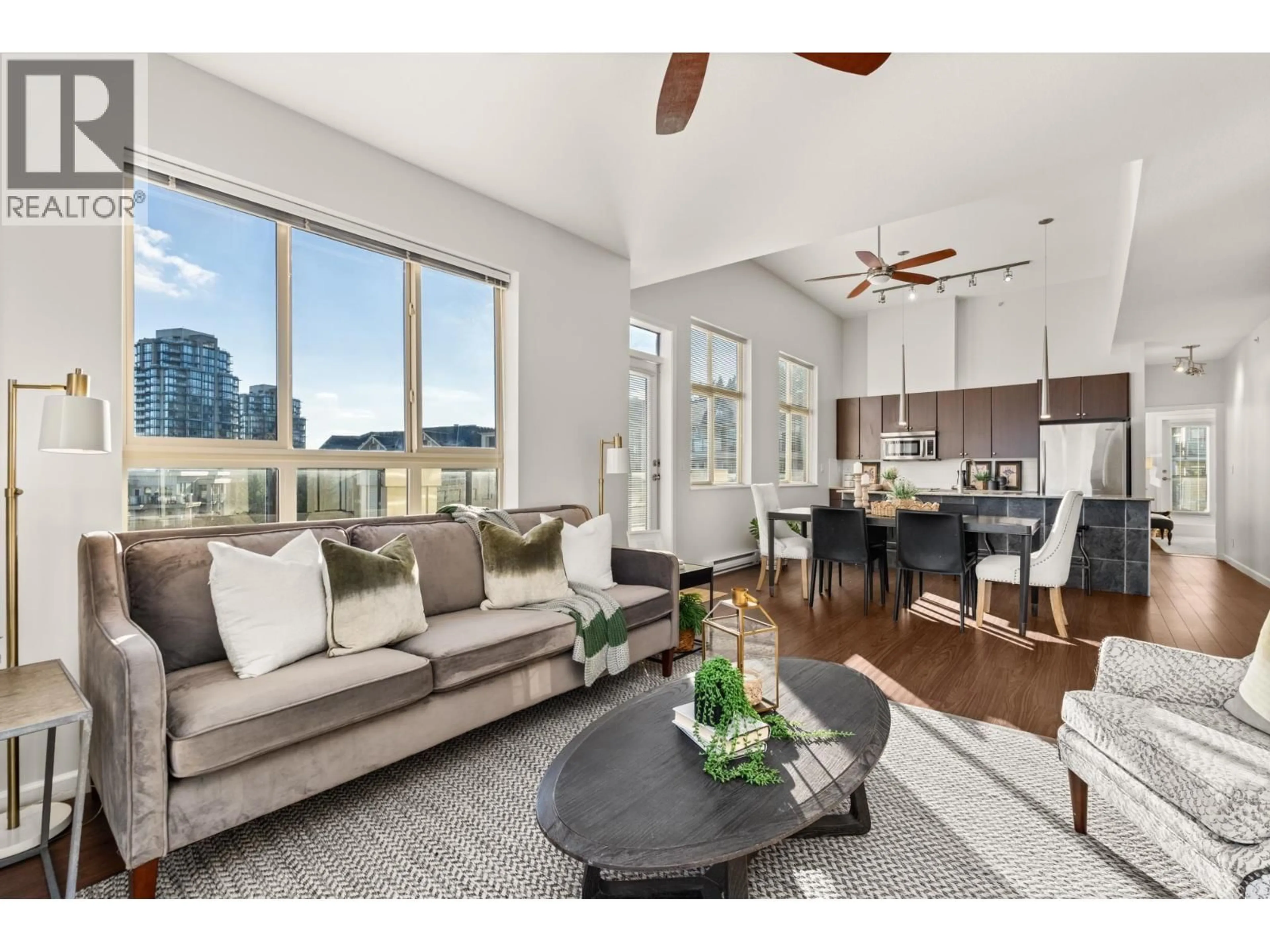 Living room with furniture, unknown for 404 - 270 FRANCIS WAY, New Westminster British Columbia V3L0C3