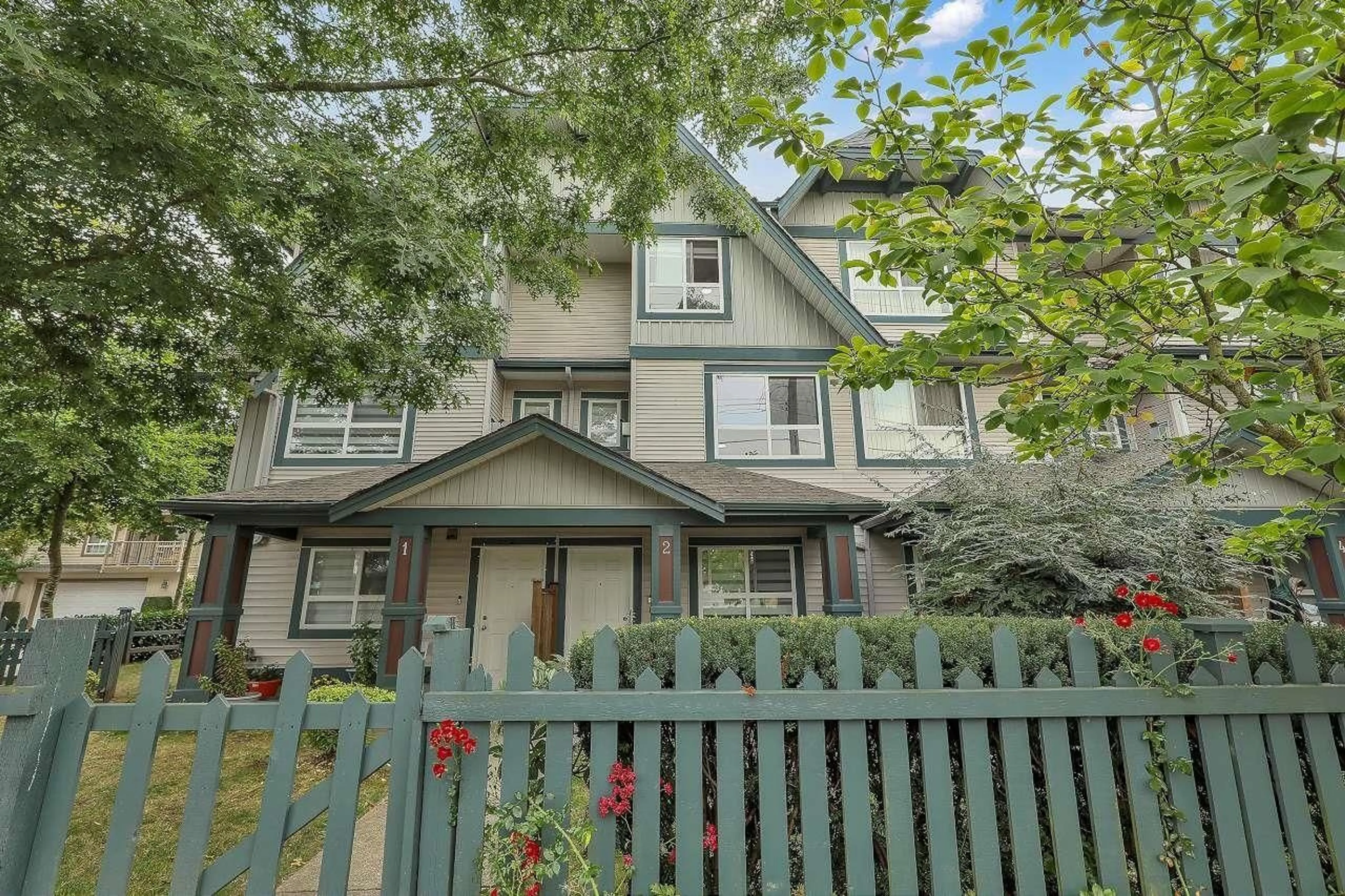 Home with vinyl exterior material, street for 2 - 12730 66 AVENUE, Surrey British Columbia V3W1P3