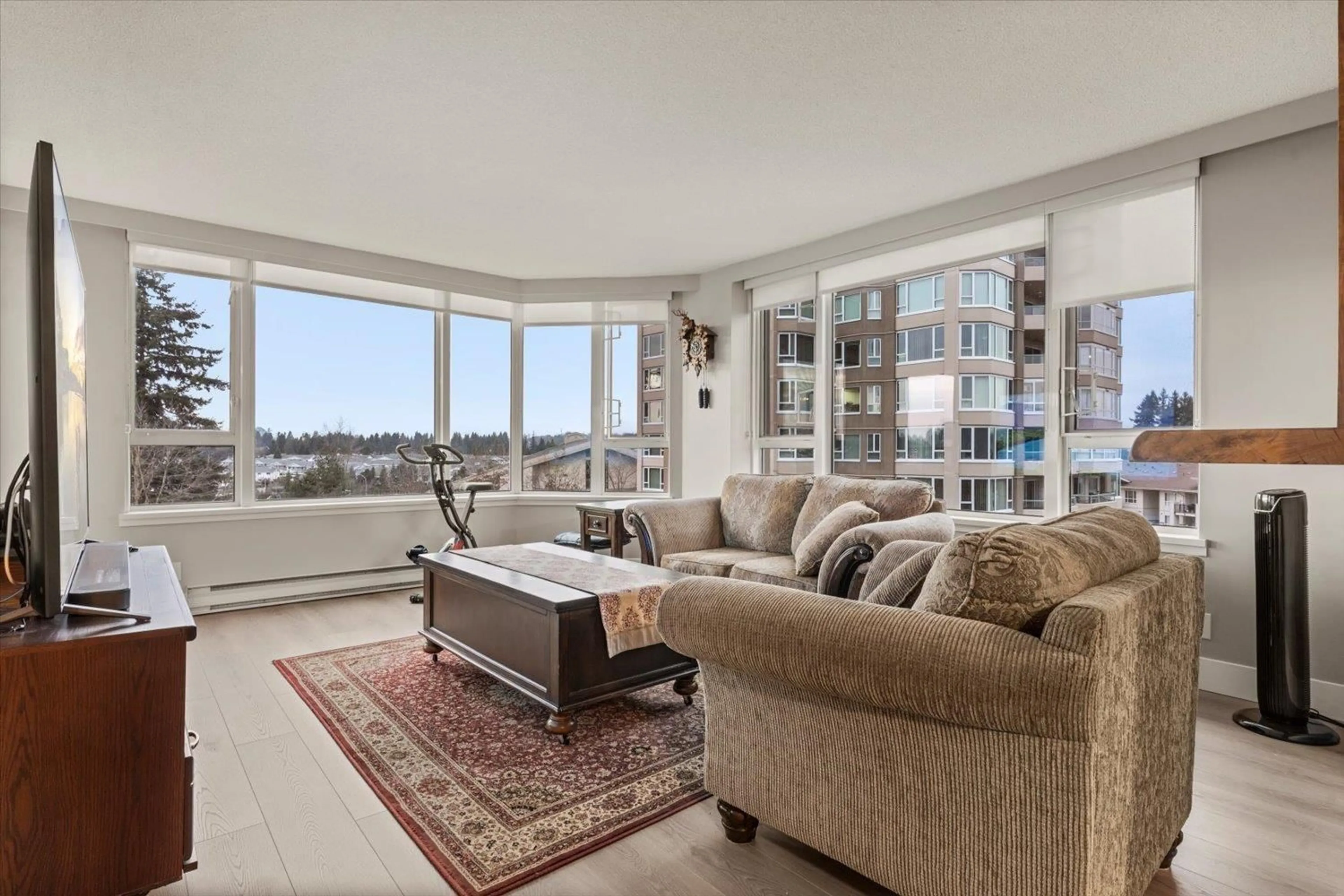 Living room with furniture, unknown for 701 - 3170 GLADWIN ROAD, Abbotsford British Columbia V2T5T5