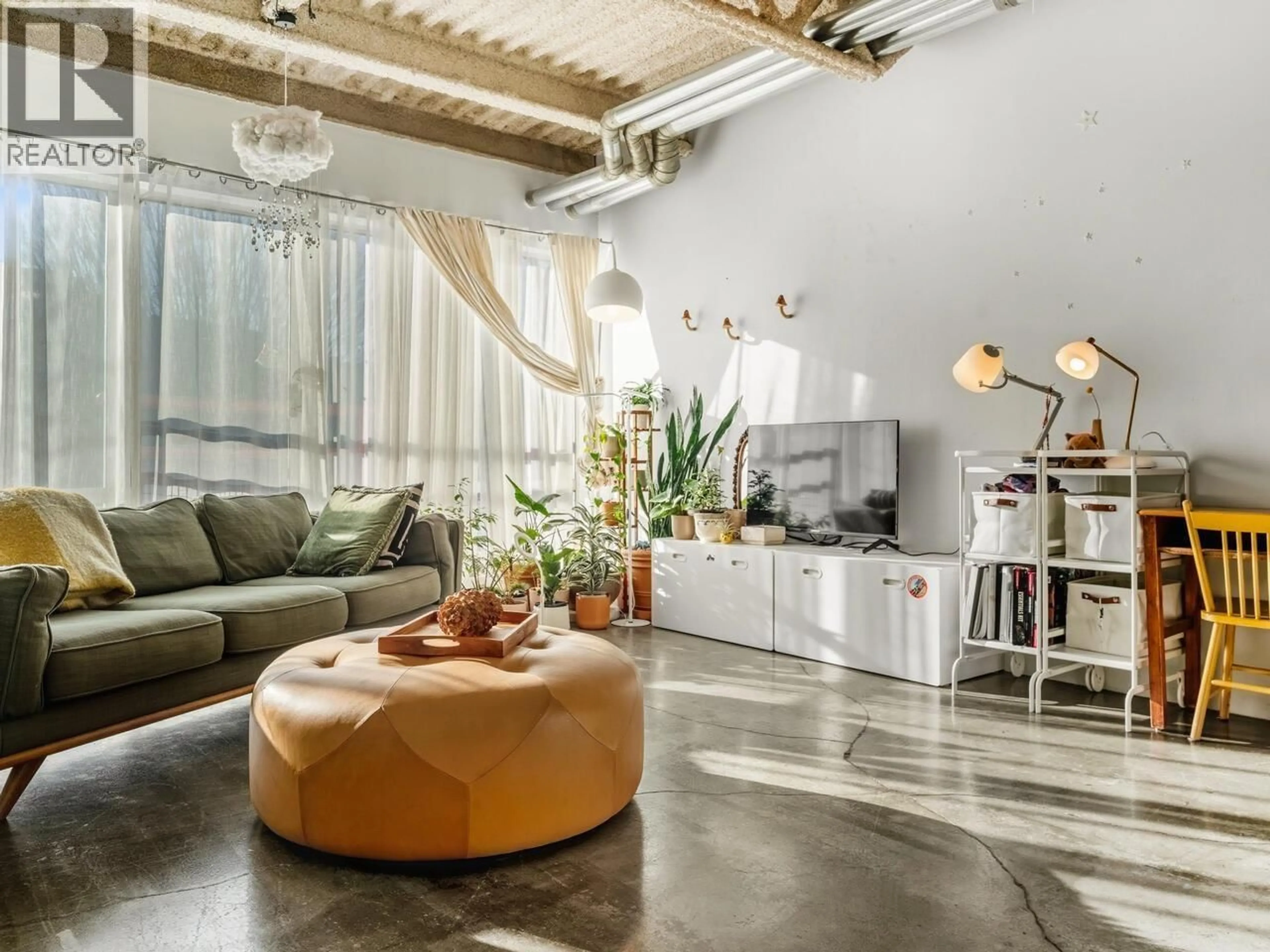 Living room with furniture, cement floor for 327 - 350 2ND AVENUE, Vancouver British Columbia V5T4R8