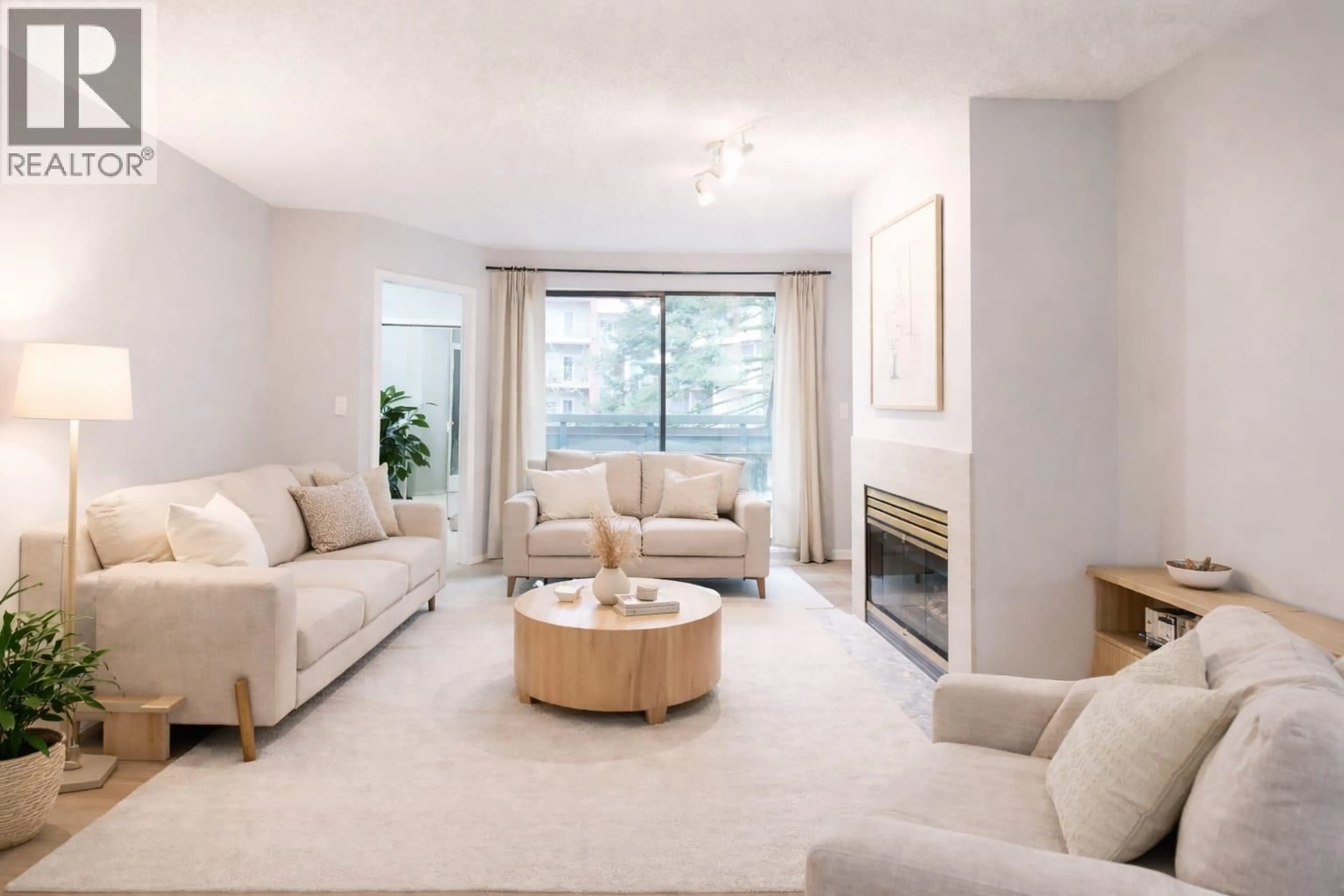 Living room with furniture, unknown for 411 - 2915 GLEN DRIVE, Coquitlam British Columbia V3B7H8