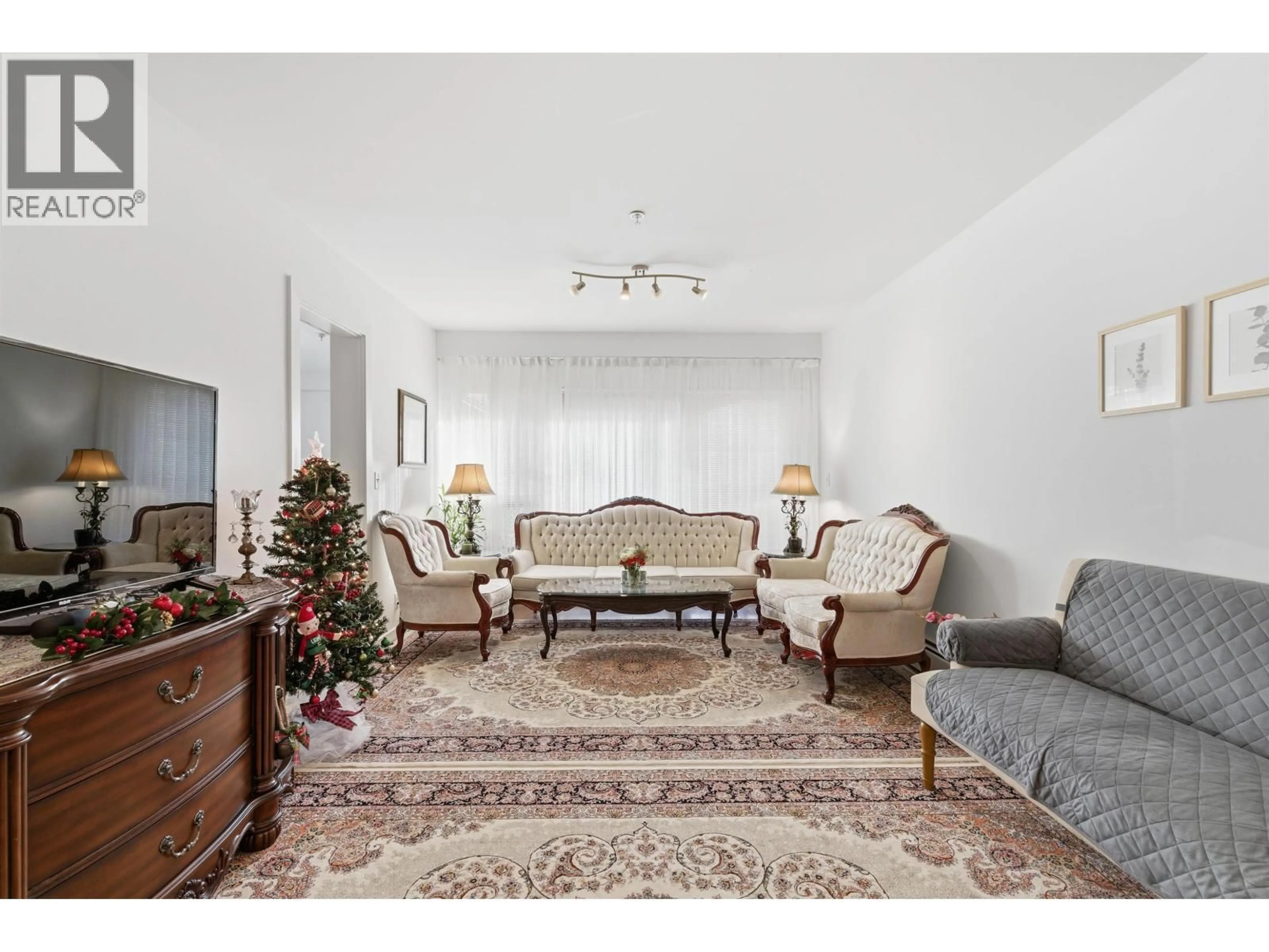 Living room with furniture, carpet floor for 109 - 1033 ST. GEORGES AVENUE, North Vancouver British Columbia V7L3H5