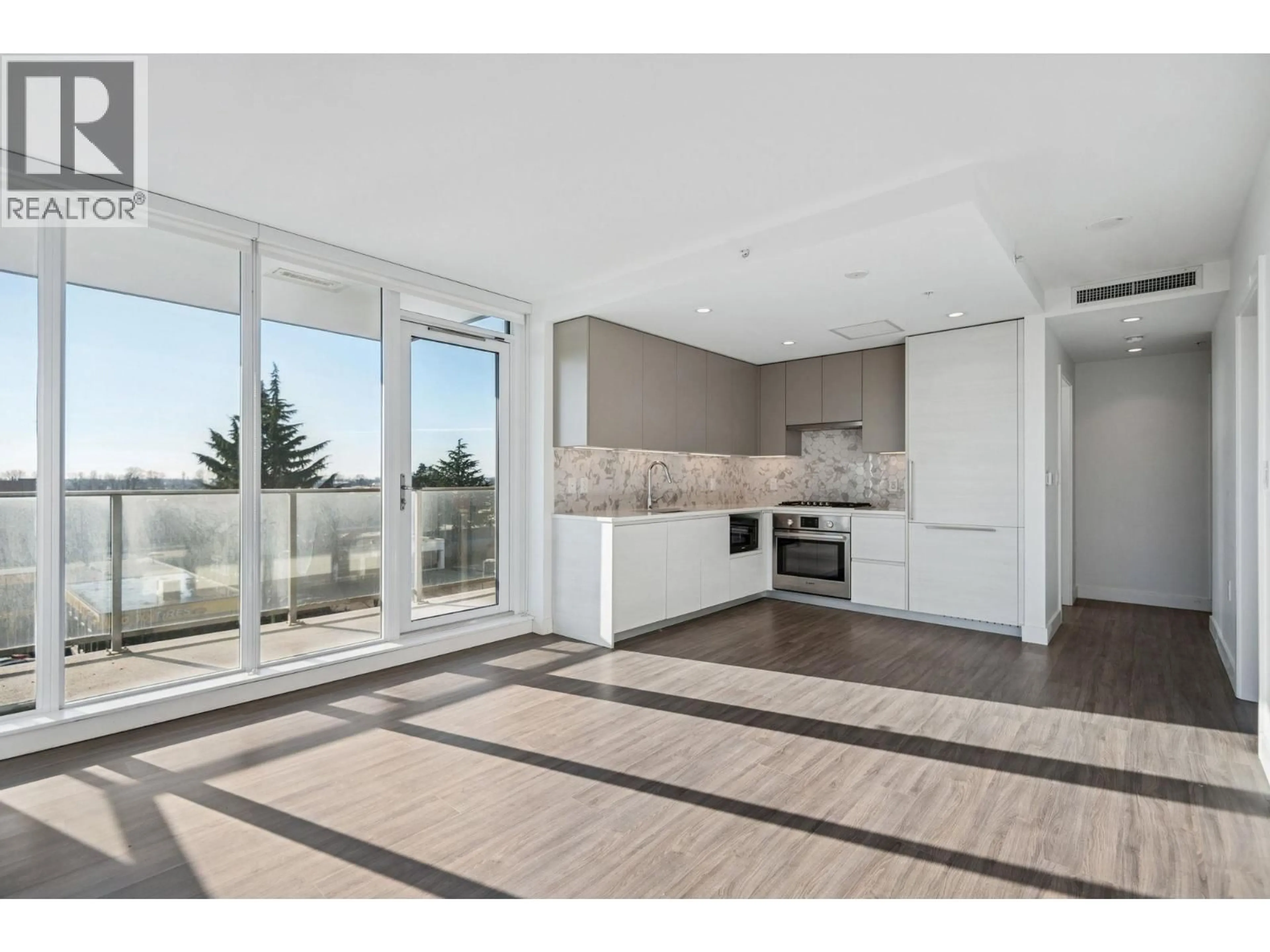 Open concept kitchen, ceramic/tile floor for 306 - 8181 CHESTER STREET, Vancouver British Columbia V5X0J9