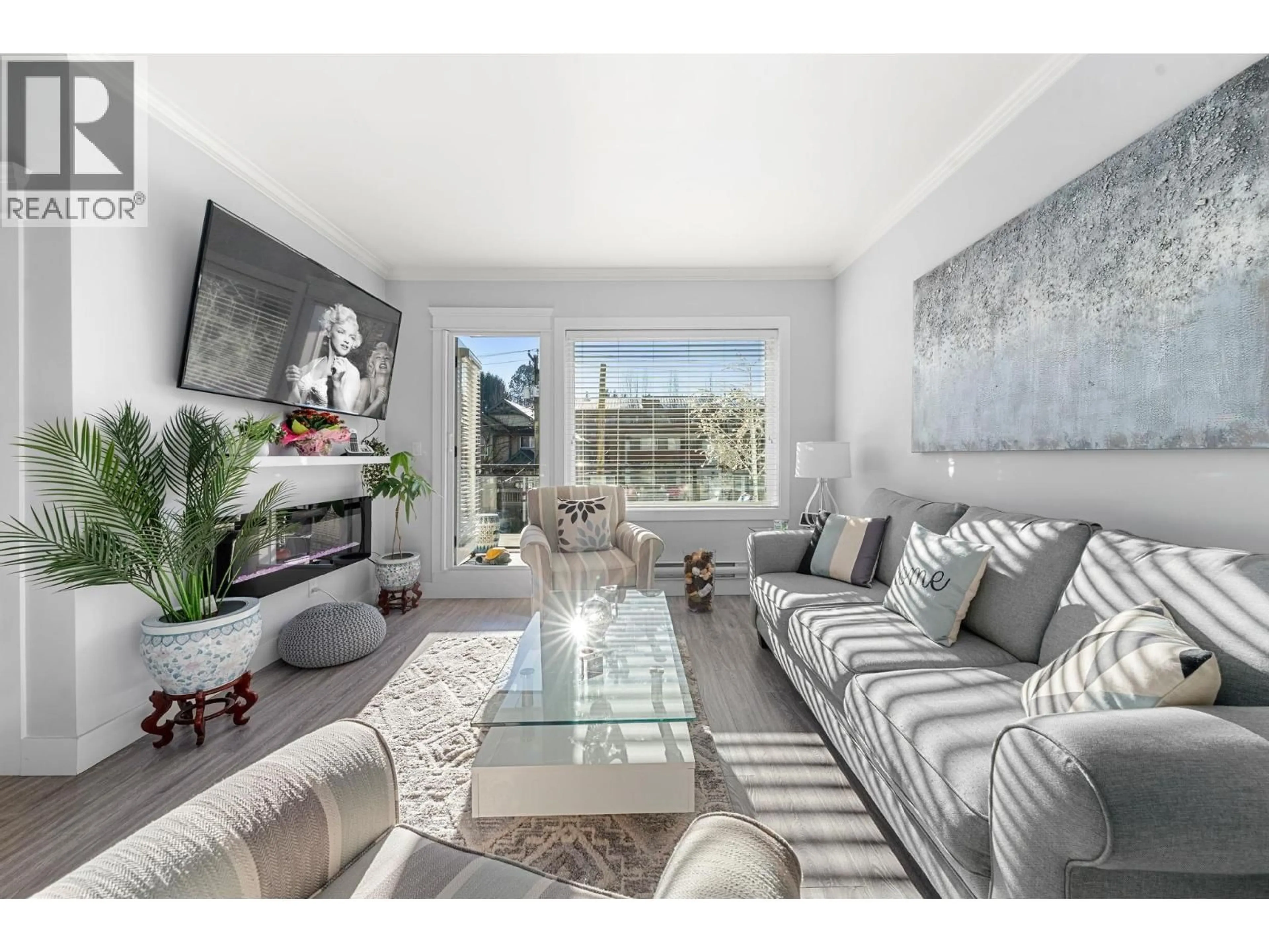 Living room with furniture, unknown for 203 - 2229 ATKINS AVENUE, Port Coquitlam British Columbia V3C1Y5