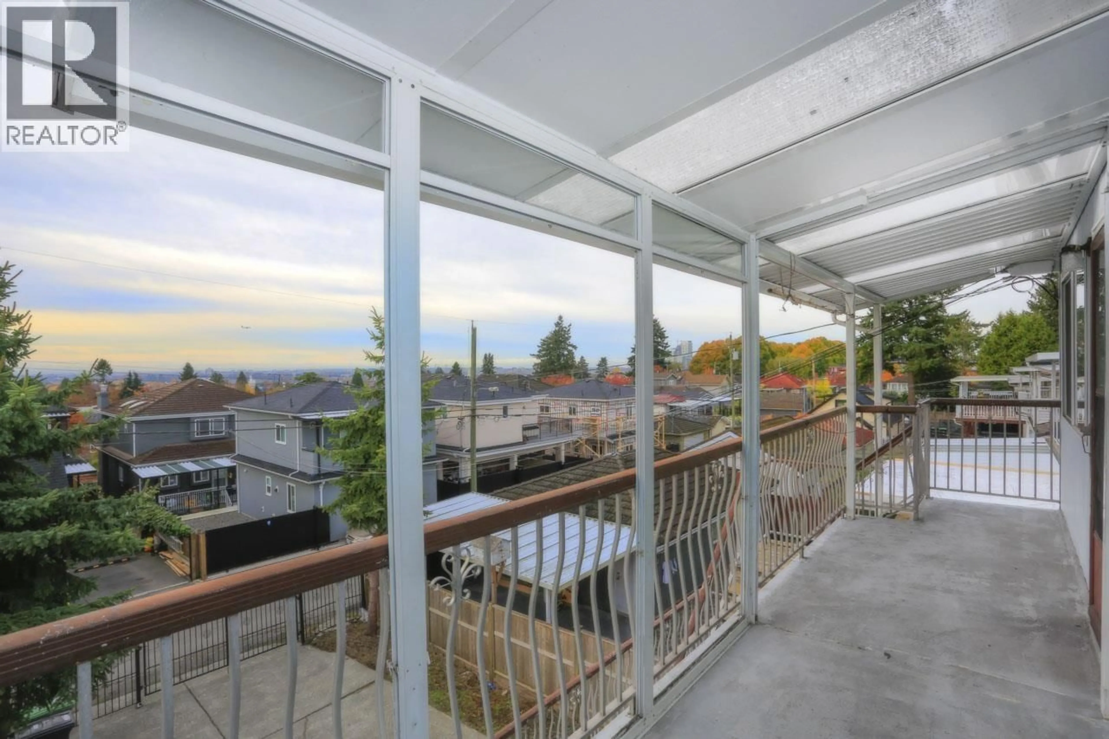 Patio, city buildings view from balcony for 448 59TH AVENUE, Vancouver British Columbia V5X1Y1