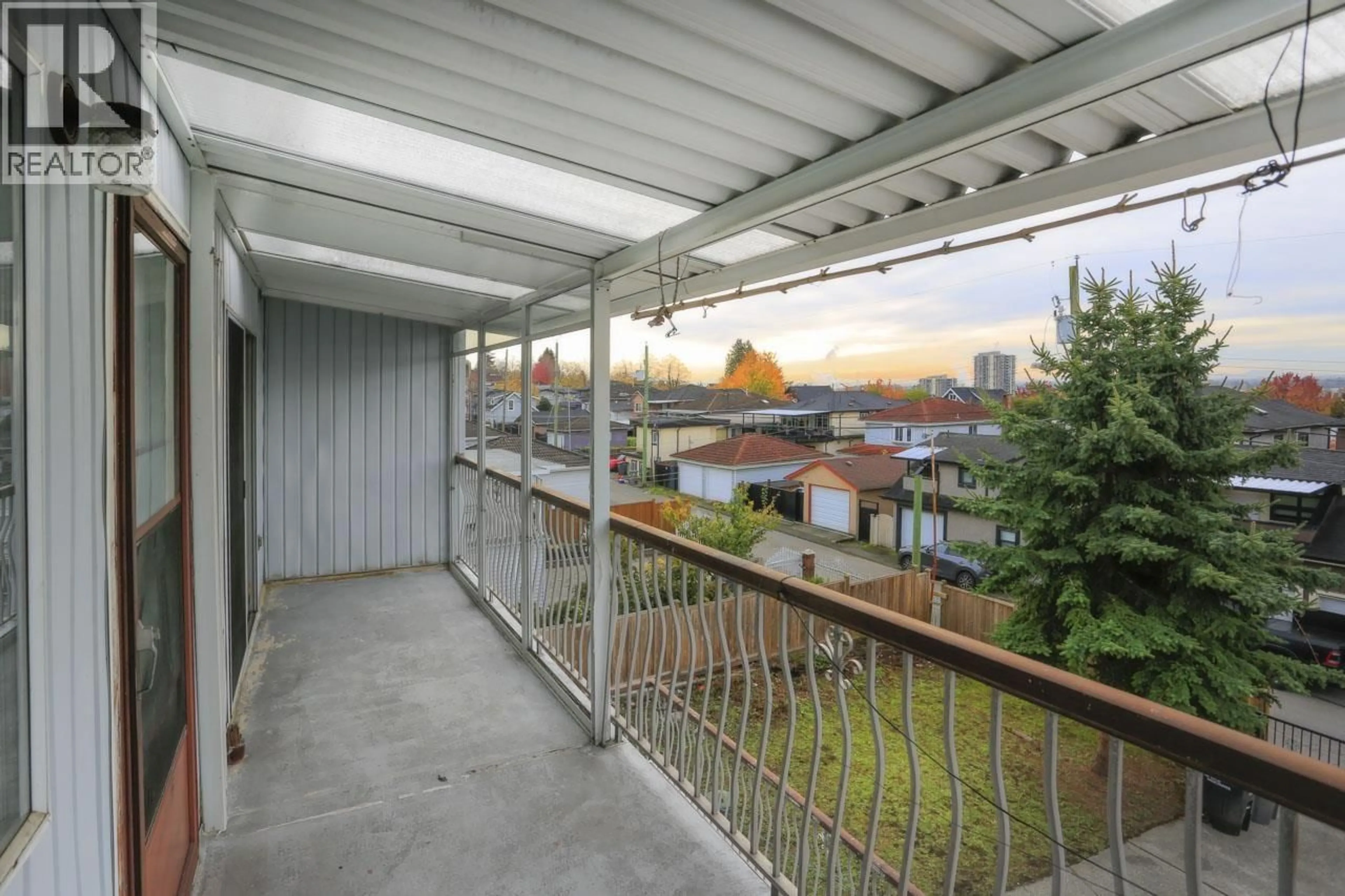 Patio, city buildings view from balcony for 448 59TH AVENUE, Vancouver British Columbia V5X1Y1