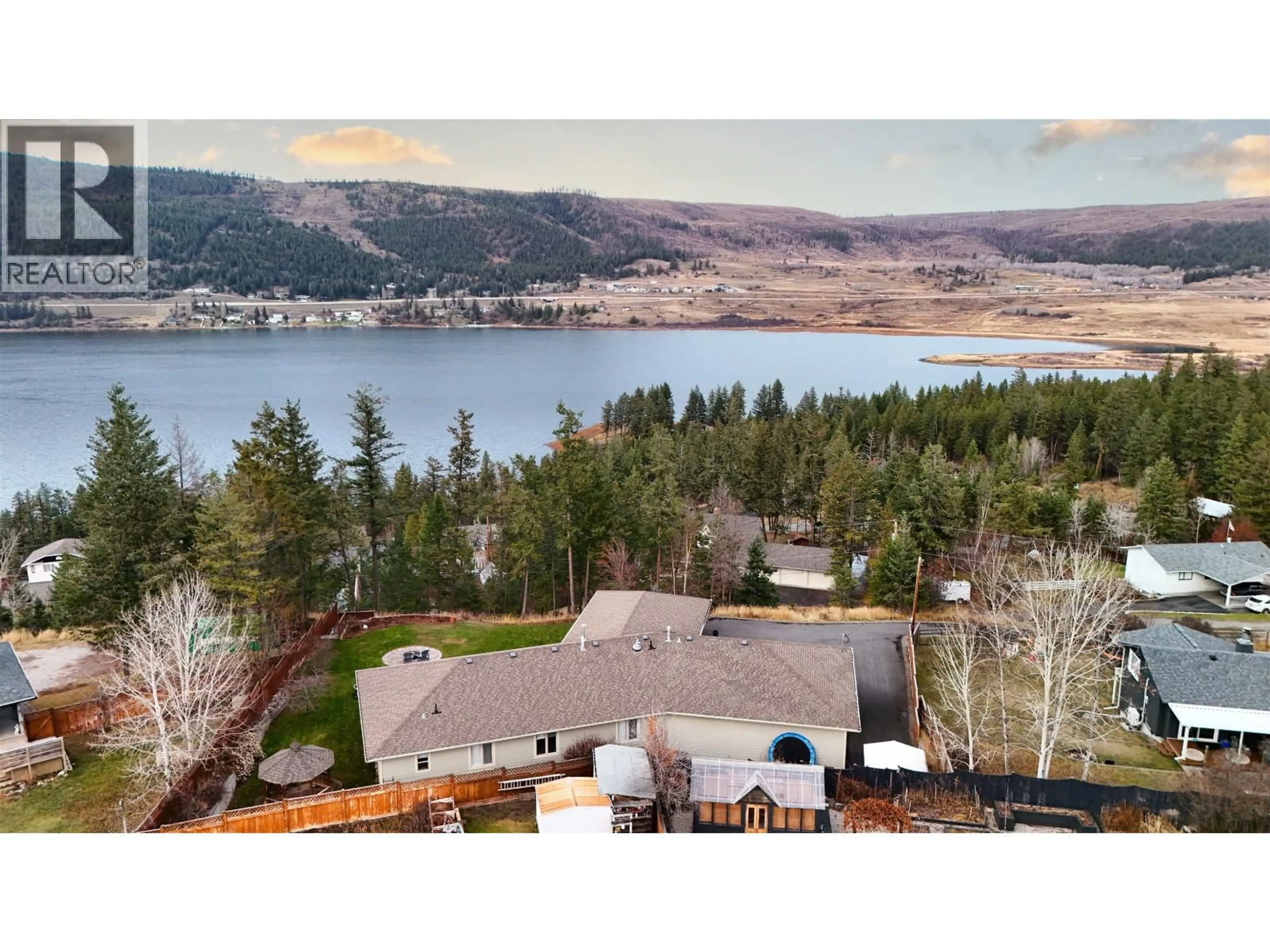 A pic from outside/outdoor area/front of a property/back of a property/a pic from drone, water/lake/river/ocean view for 2129 SOUTH LAKESIDE DRIVE, Williams Lake British Columbia V2G5G2