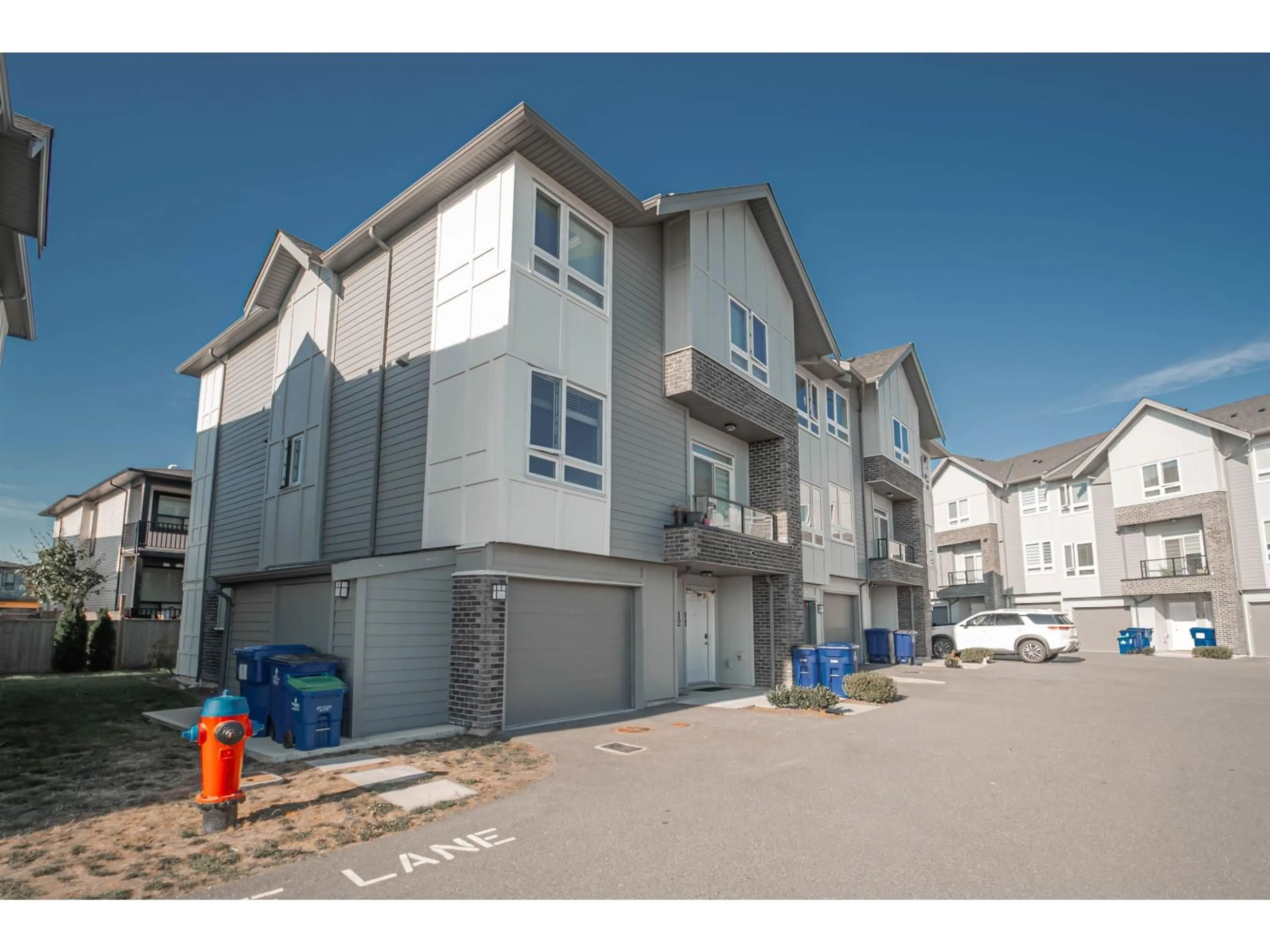 A pic from outside/outdoor area/front of a property/back of a property/a pic from drone, street for 12 - 3323 ROCKHILL PLACE, Abbotsford British Columbia V2T0J9