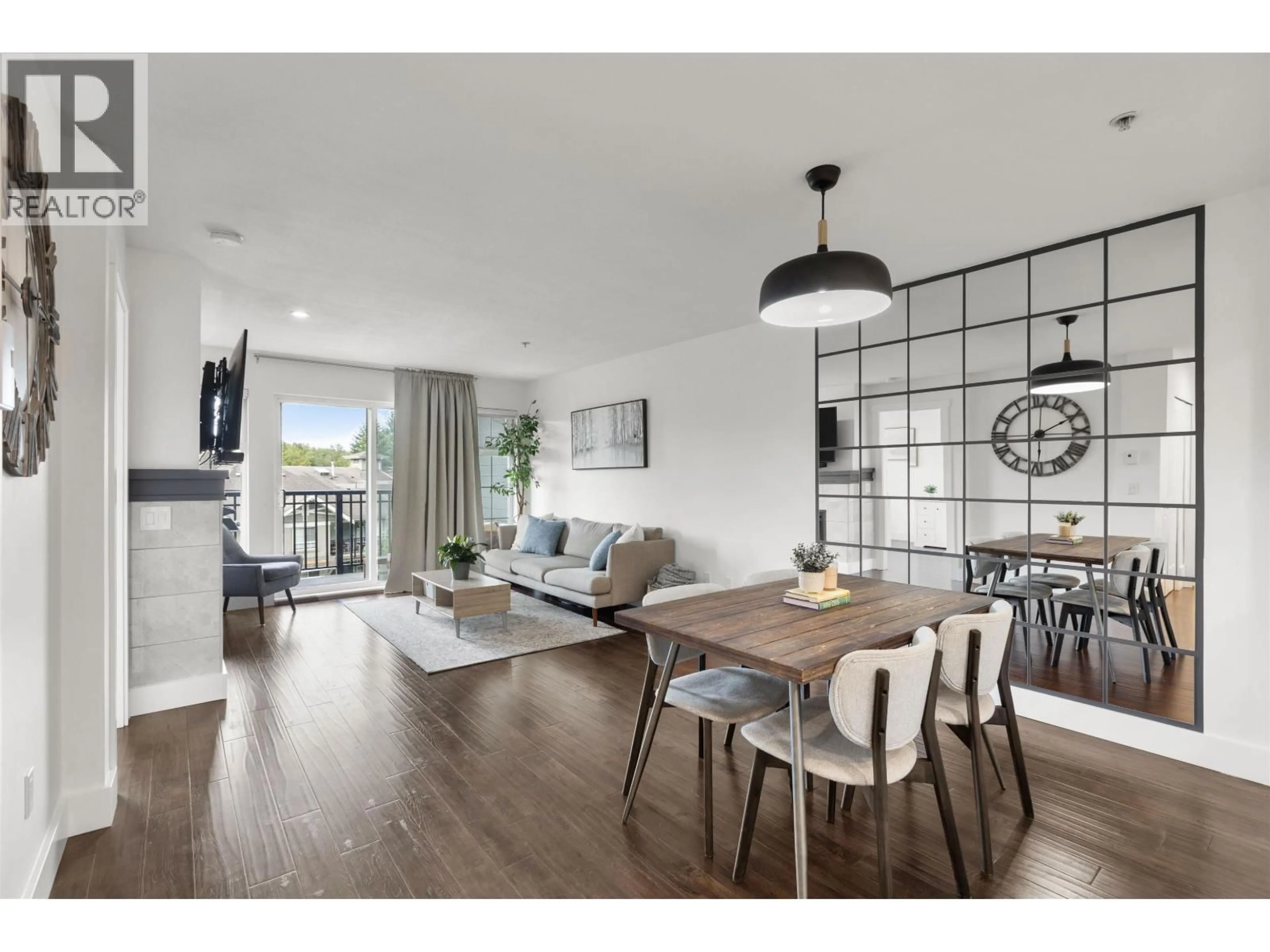 Living room with furniture, wood/laminate floor for 311 - 9098 HALSTON COURT, Burnaby British Columbia V3N0A6