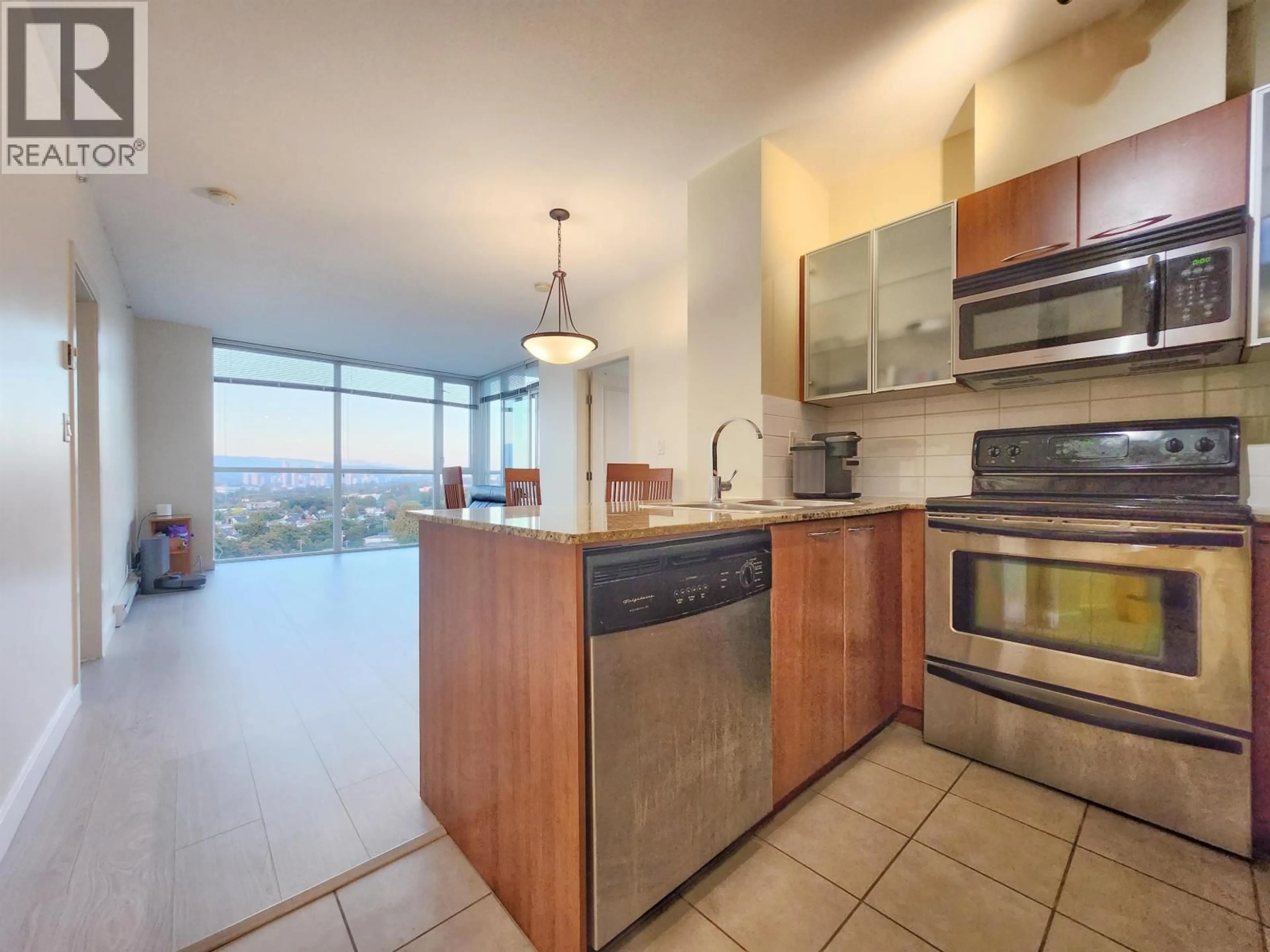 Open concept kitchen, ceramic/tile floor for 1307 - 4028 KNIGHT STREET, Vancouver British Columbia V5N5Y8