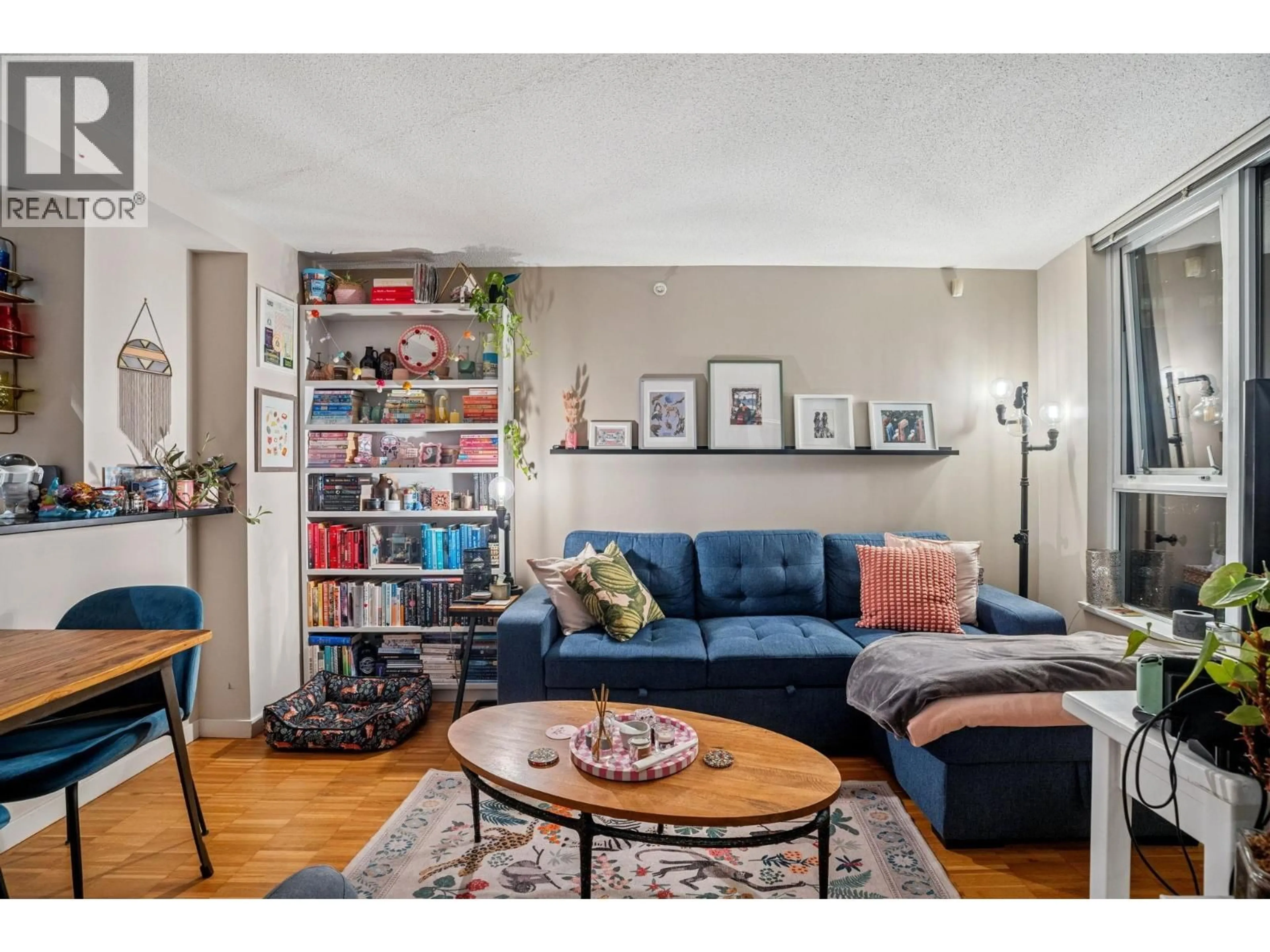 Living room with furniture, wood/laminate floor for 1901 - 33 SMITHE STREET, Vancouver British Columbia V6B0B5