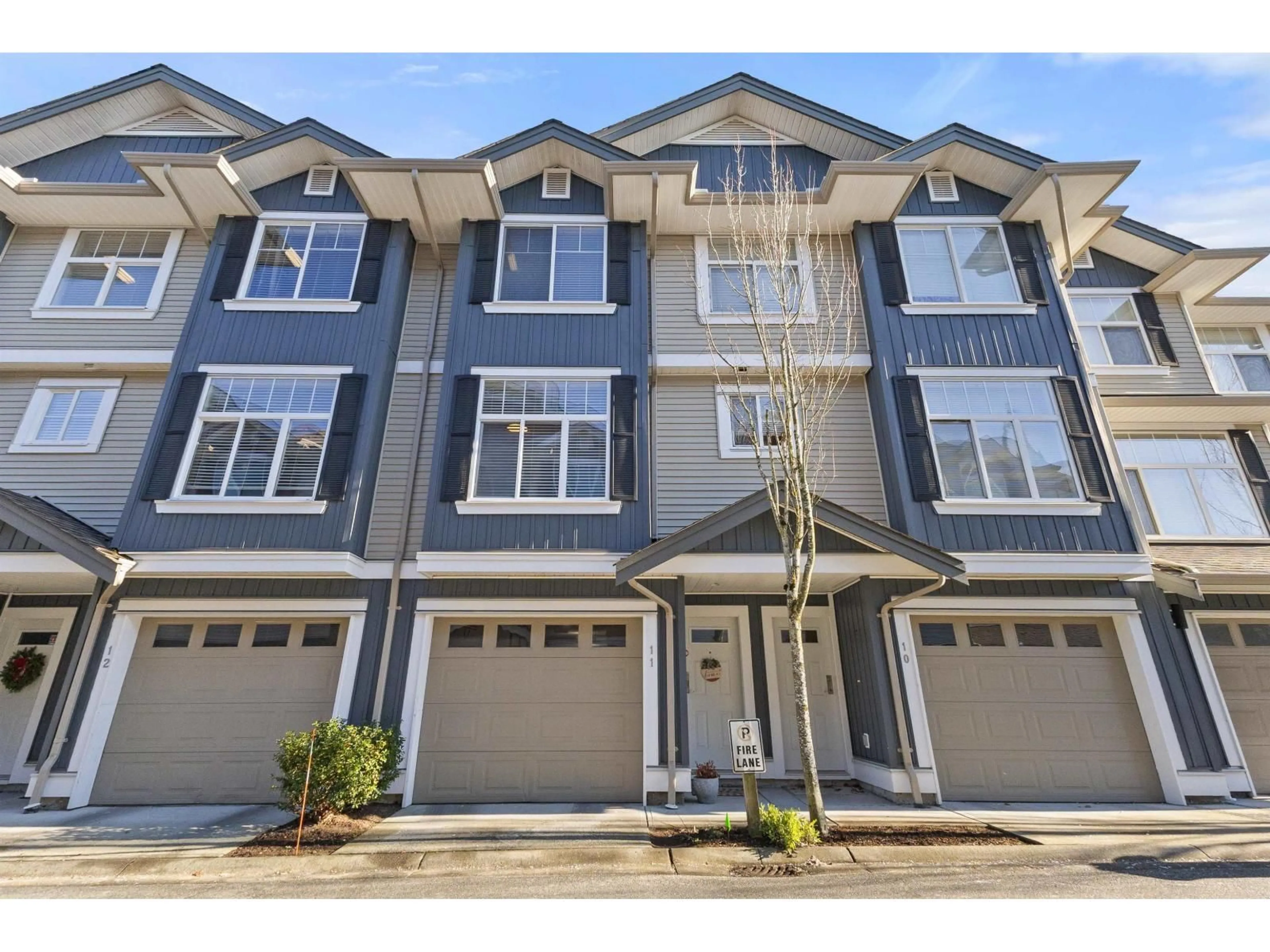 Home with vinyl exterior material, street for 11 - 6956 193 STREET, Surrey British Columbia V4N6E7