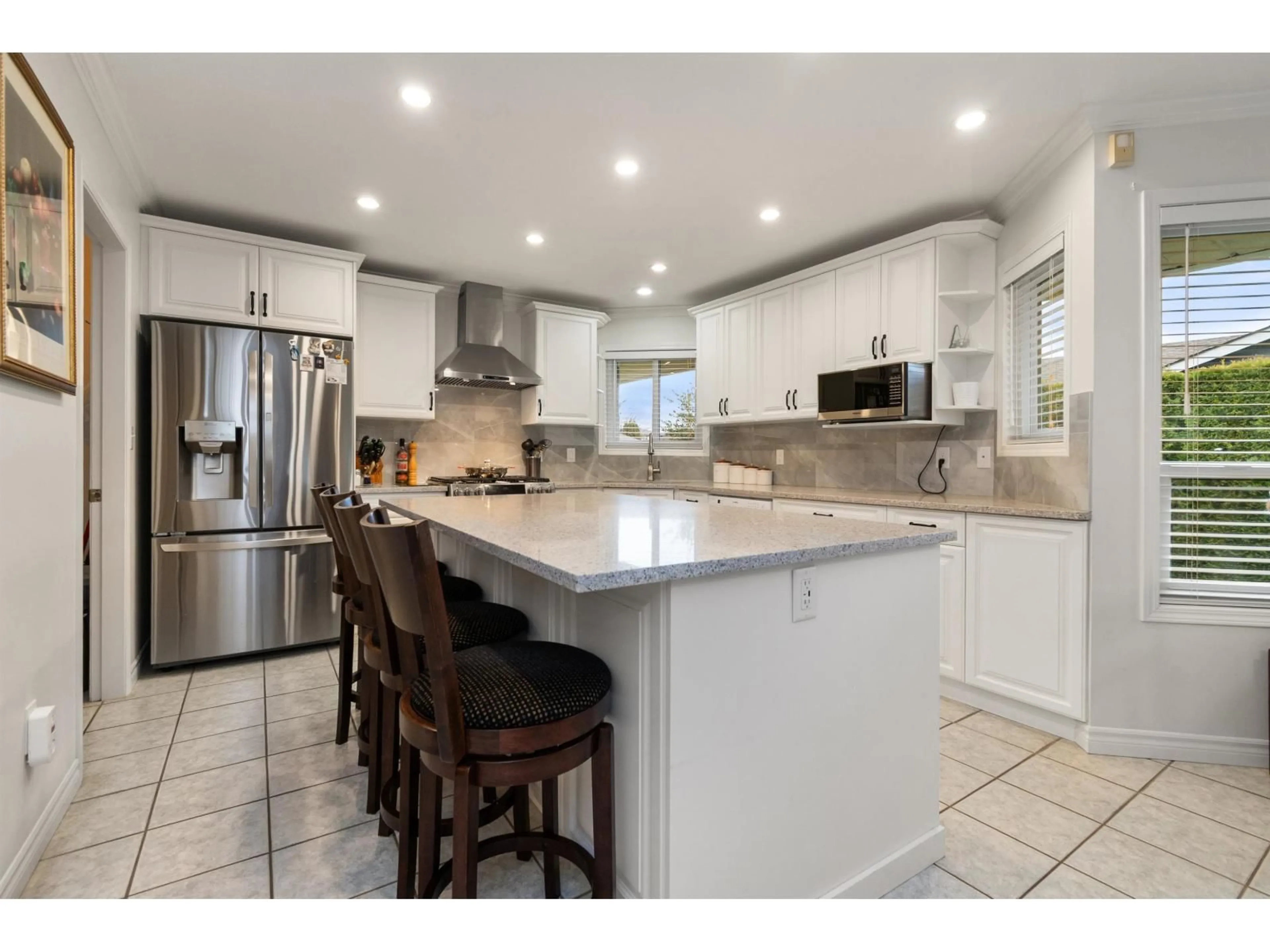 Open concept kitchen, ceramic/tile floor for 6792 HENRY STREET, Chilliwack British Columbia V2R2W1