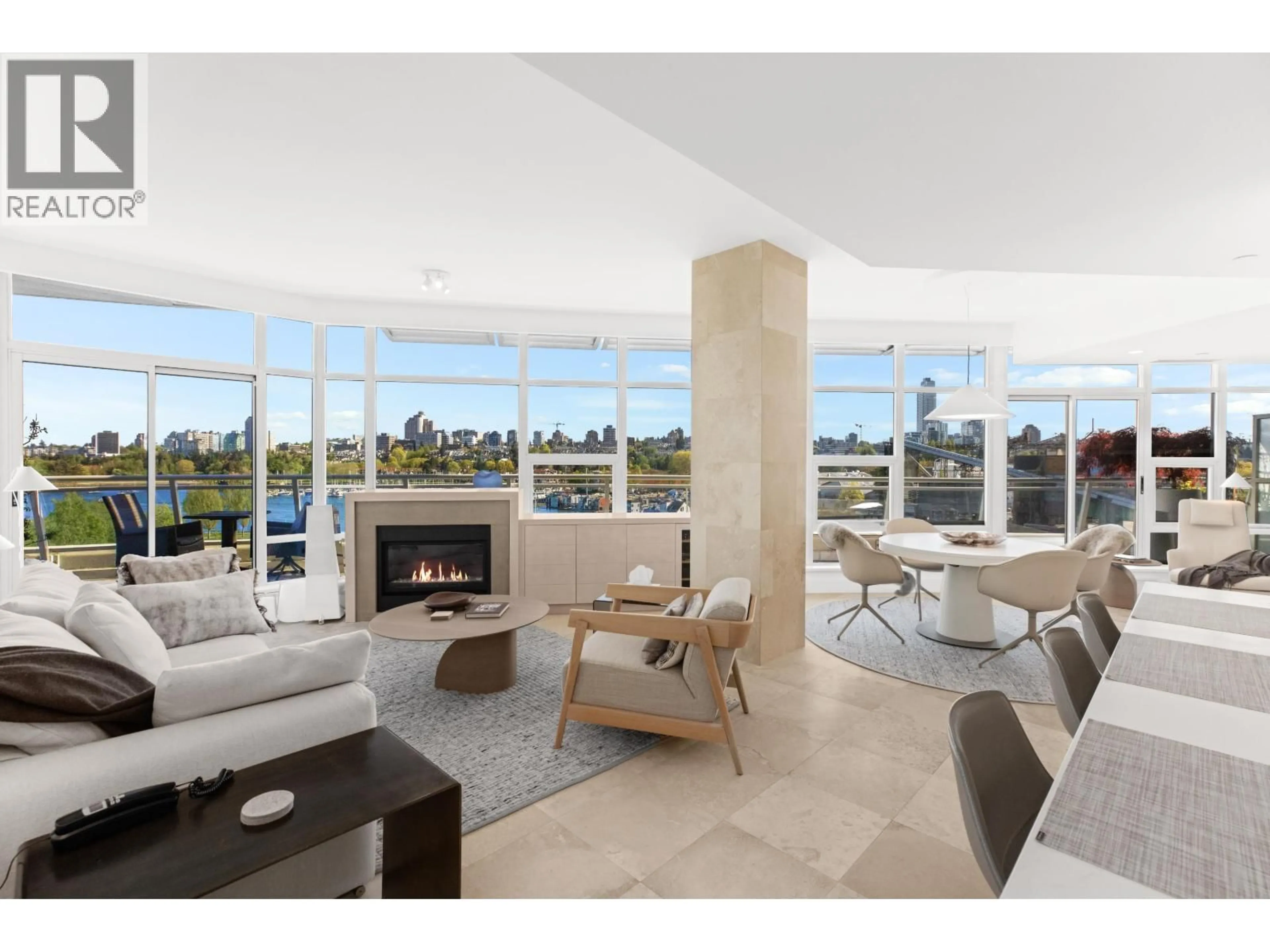 Living room with furniture, ceramic/tile floor for 701 - 628 KINGHORNE MEWS, Vancouver British Columbia V6Z3H6