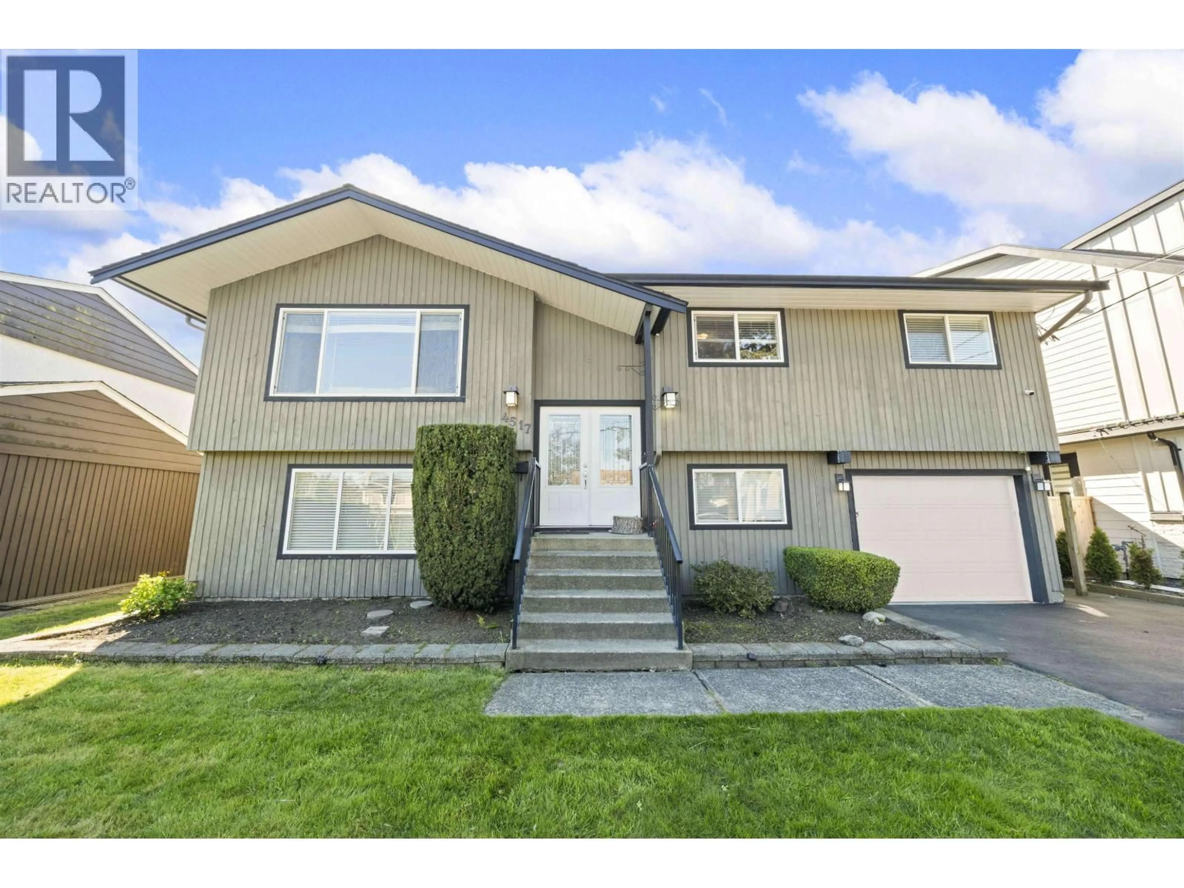 Home with vinyl exterior material, street for 4517 46A STREET, Ladner British Columbia V4K2M5