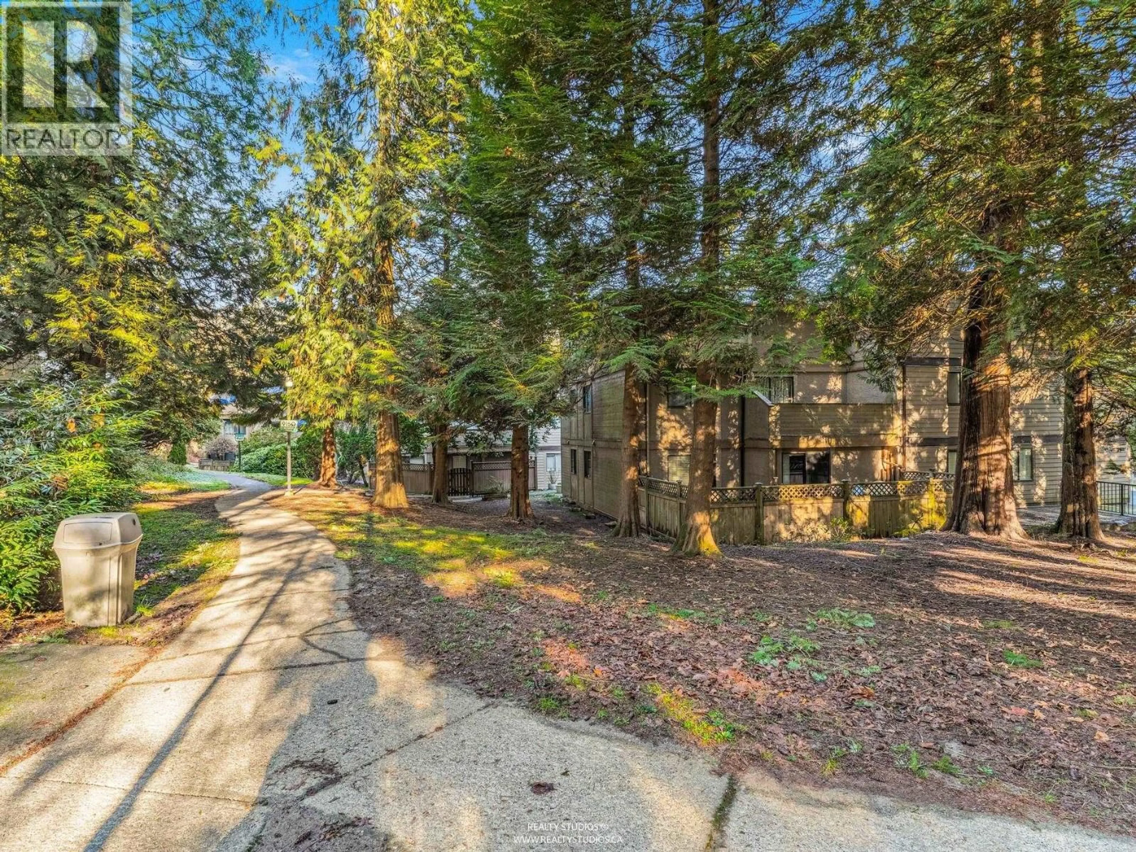 A pic from outside/outdoor area/front of a property/back of a property/a pic from drone, forest/trees view for 301 - 9148 SATURNA DRIVE, Burnaby British Columbia V3J7K2