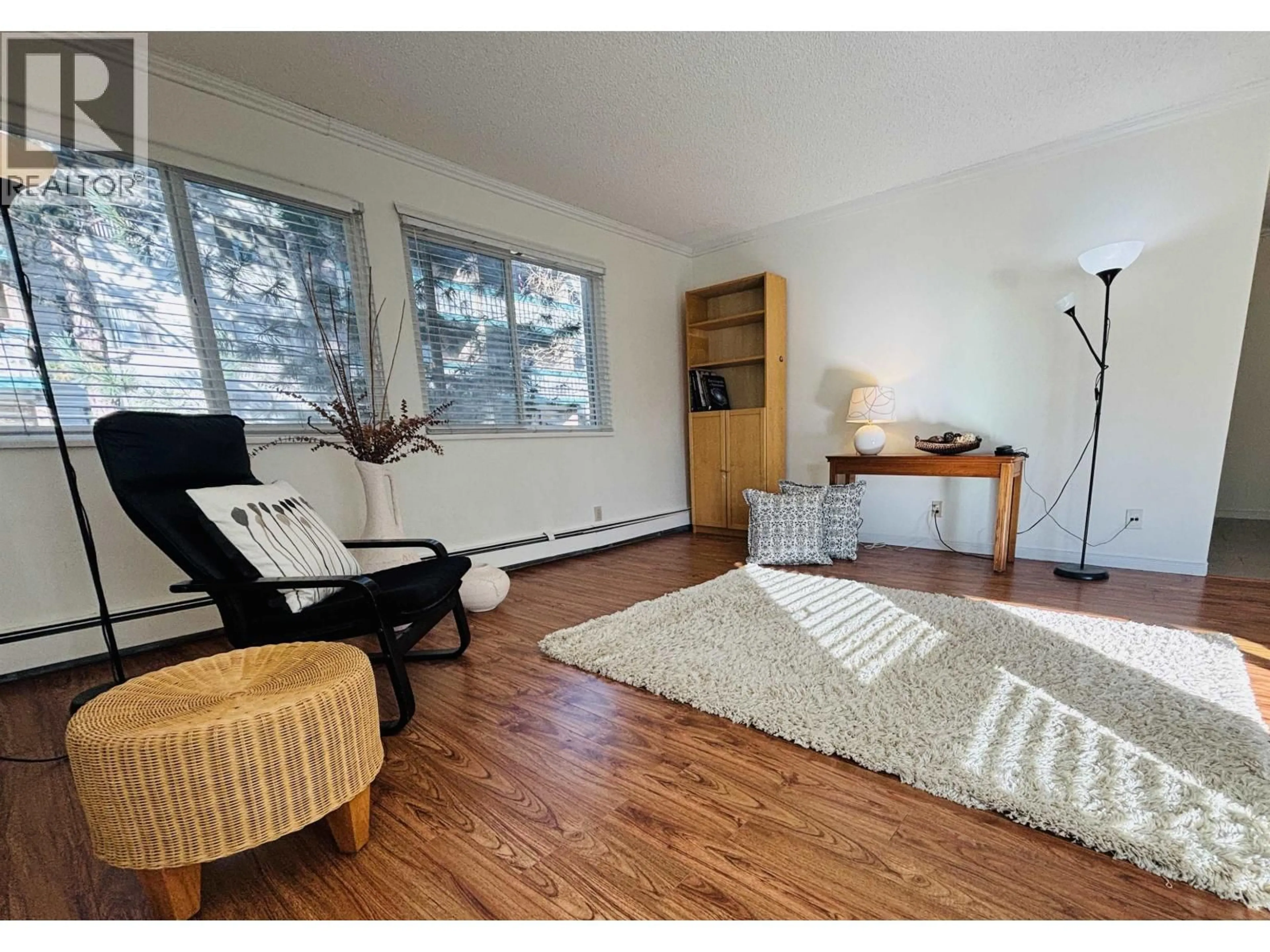 Living room with furniture, wood/laminate floor for 101 - 8870 CITATION DRIVE, Richmond British Columbia V6Y3A3