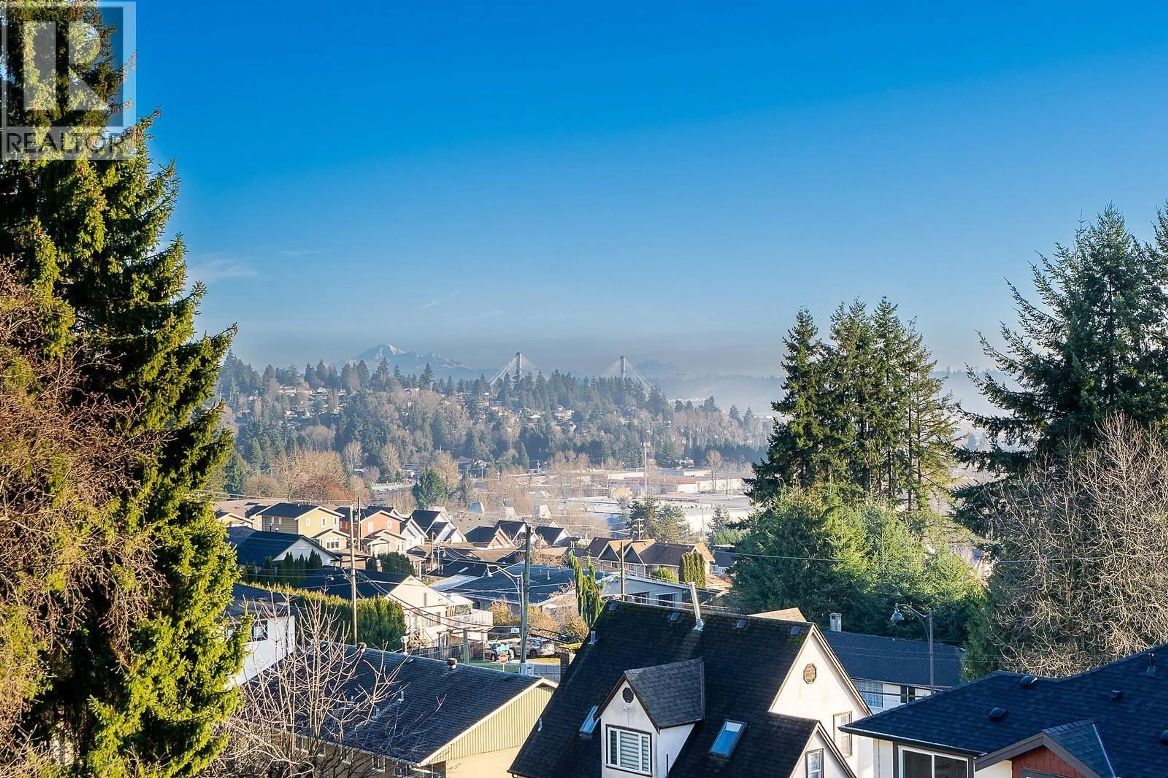 A pic from outside/outdoor area/front of a property/back of a property/a pic from drone, mountain view for 102 - 1204 HAMMOND AVENUE, Coquitlam British Columbia V3K2P5