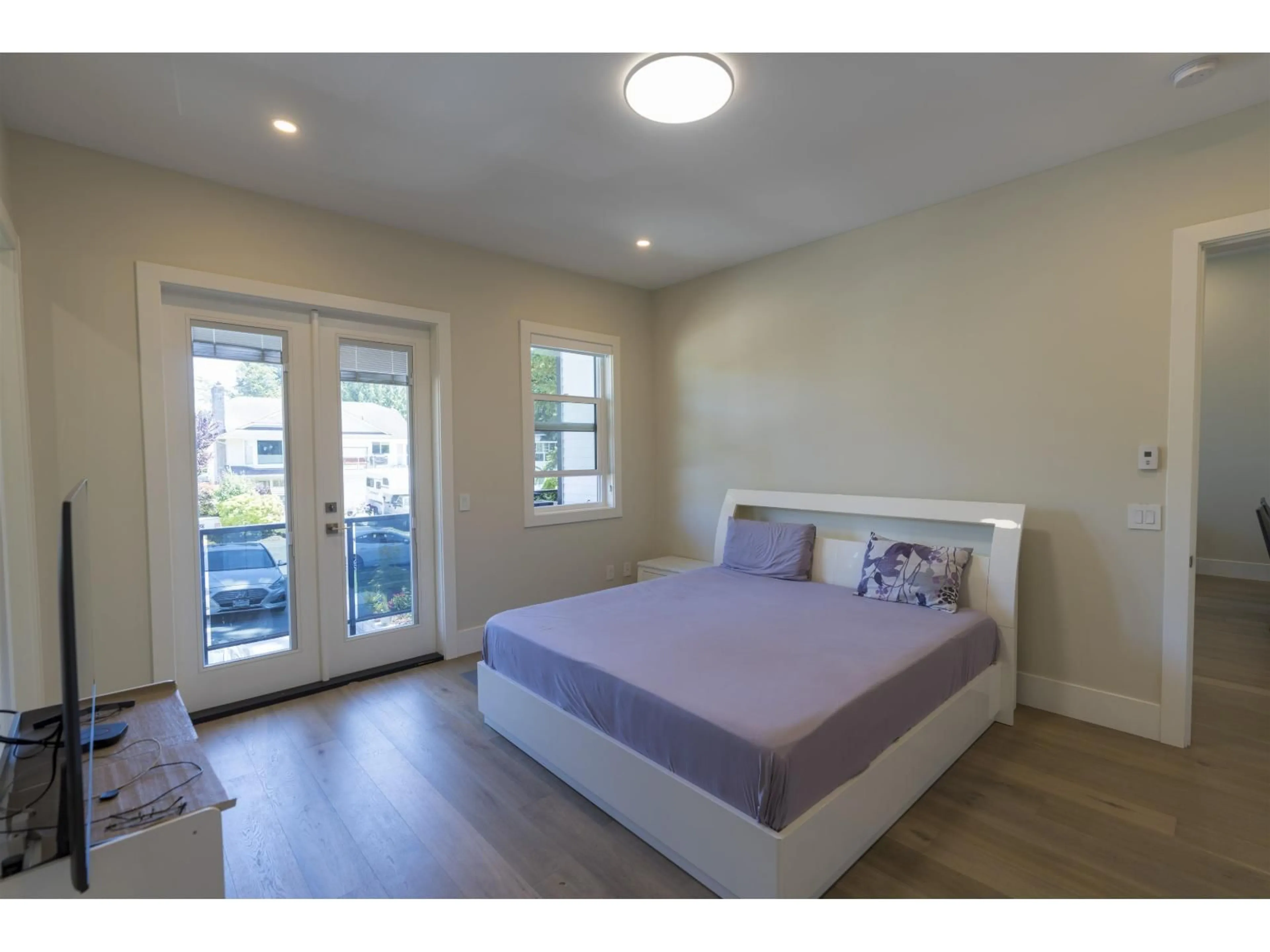 Bedroom with bed, wood/laminate floor for 937 160B STREET, Surrey British Columbia V4A9A7