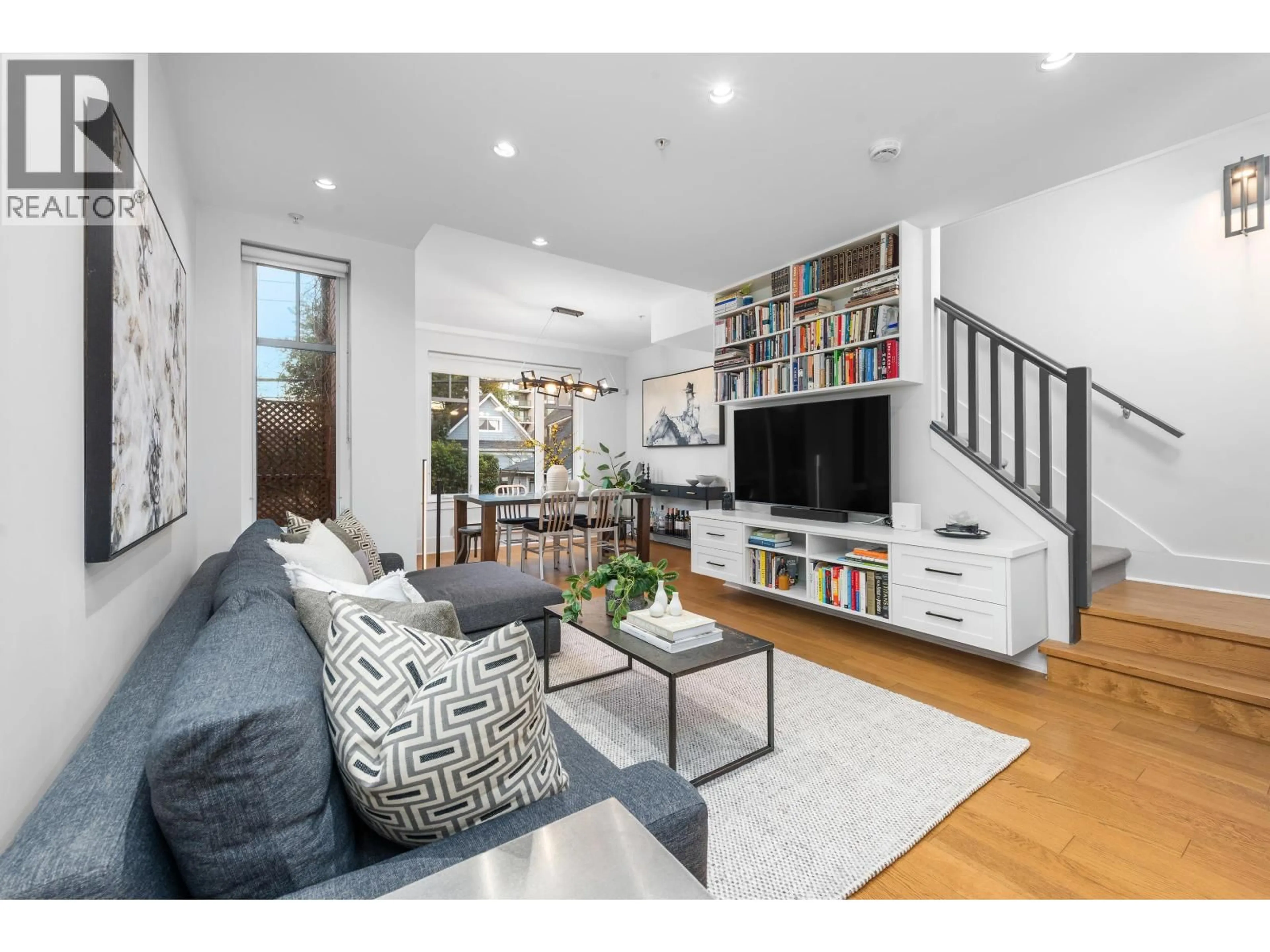 Living room with furniture, wood/laminate floor for 323 7TH AVENUE, Vancouver British Columbia V5T1M9