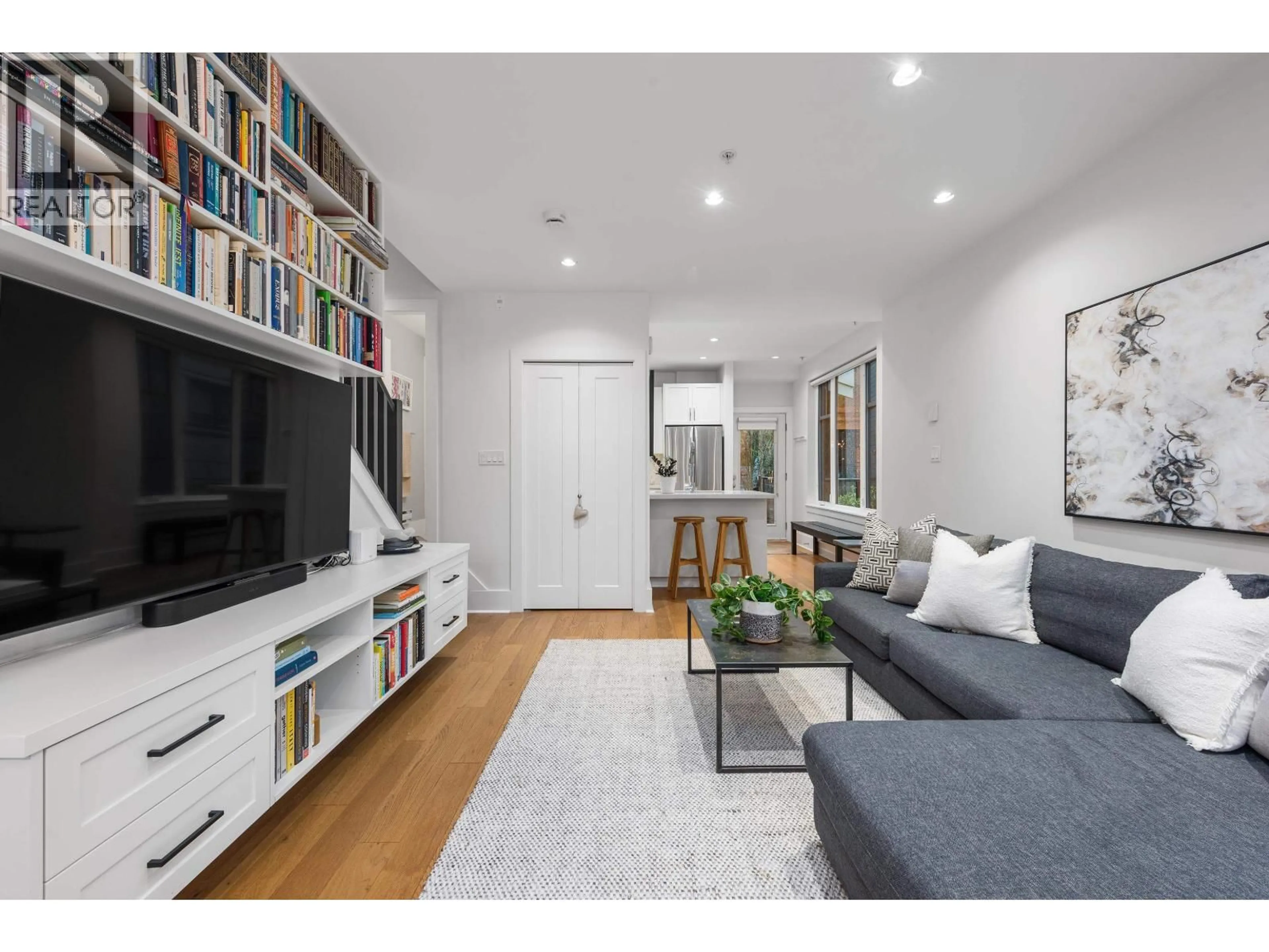 Living room with furniture, wood/laminate floor for 323 7TH AVENUE, Vancouver British Columbia V5T1M9