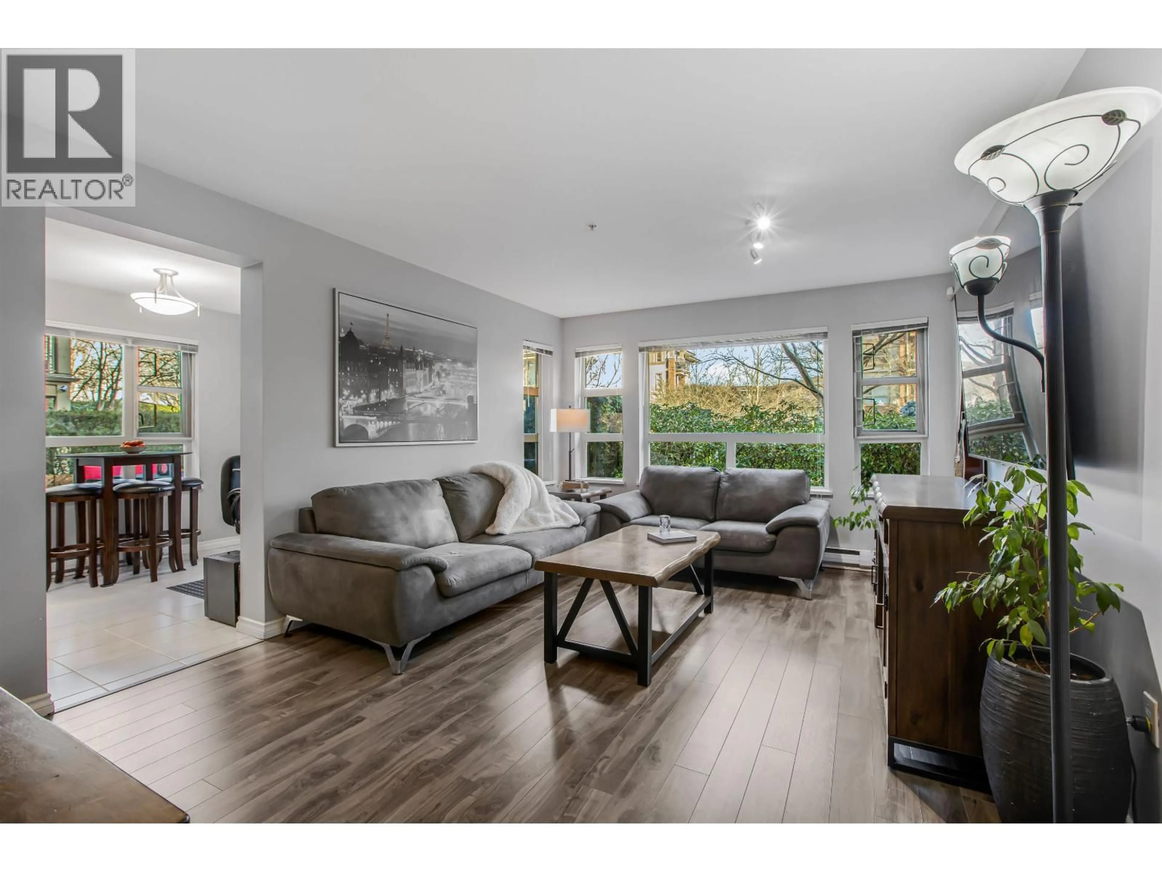Living room with furniture, wood/laminate floor for 6101 - 5117 GARDEN CITY ROAD, Richmond British Columbia V6X4H7