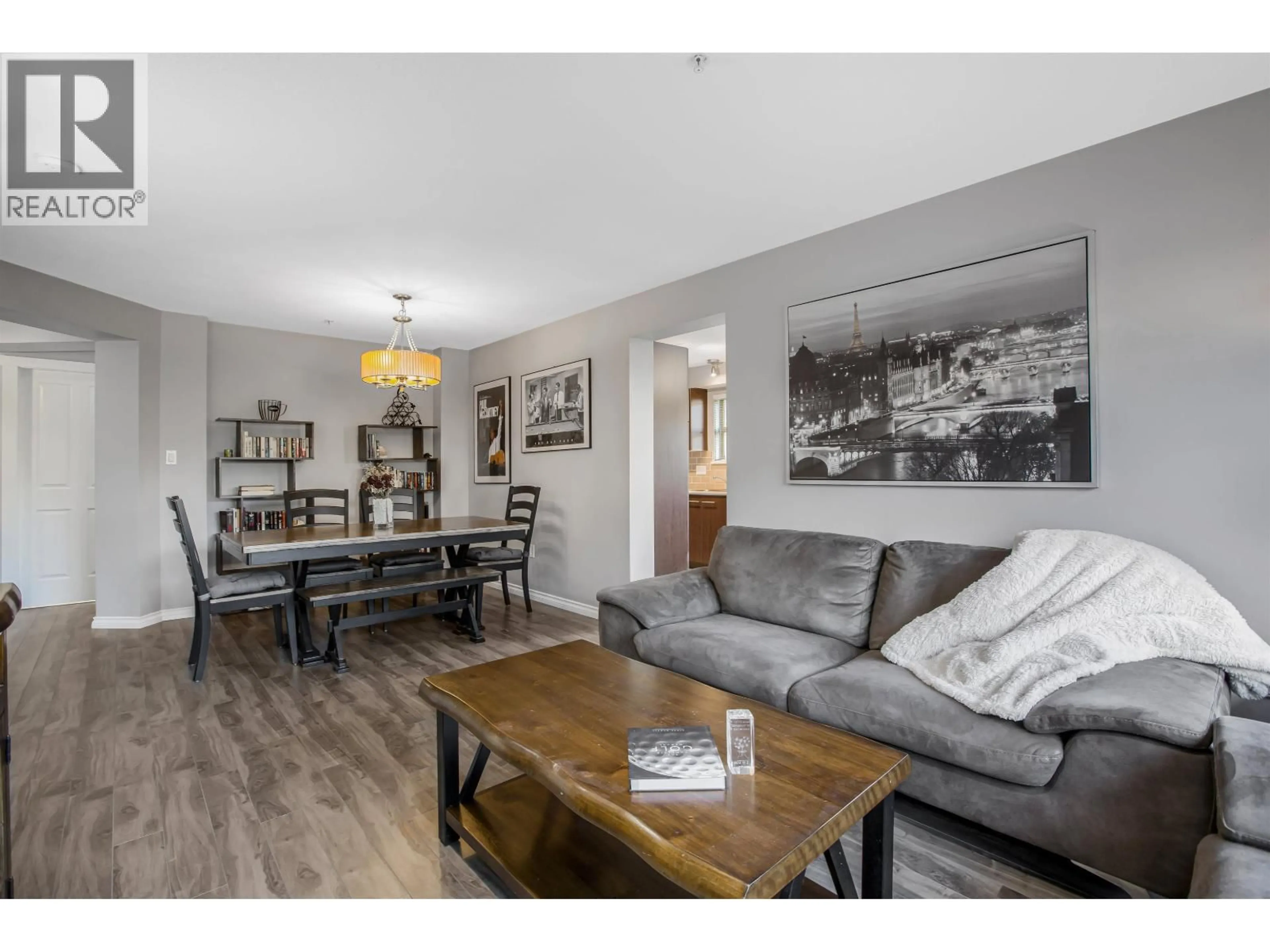 Living room with furniture, wood/laminate floor for 6101 - 5117 GARDEN CITY ROAD, Richmond British Columbia V6X4H7