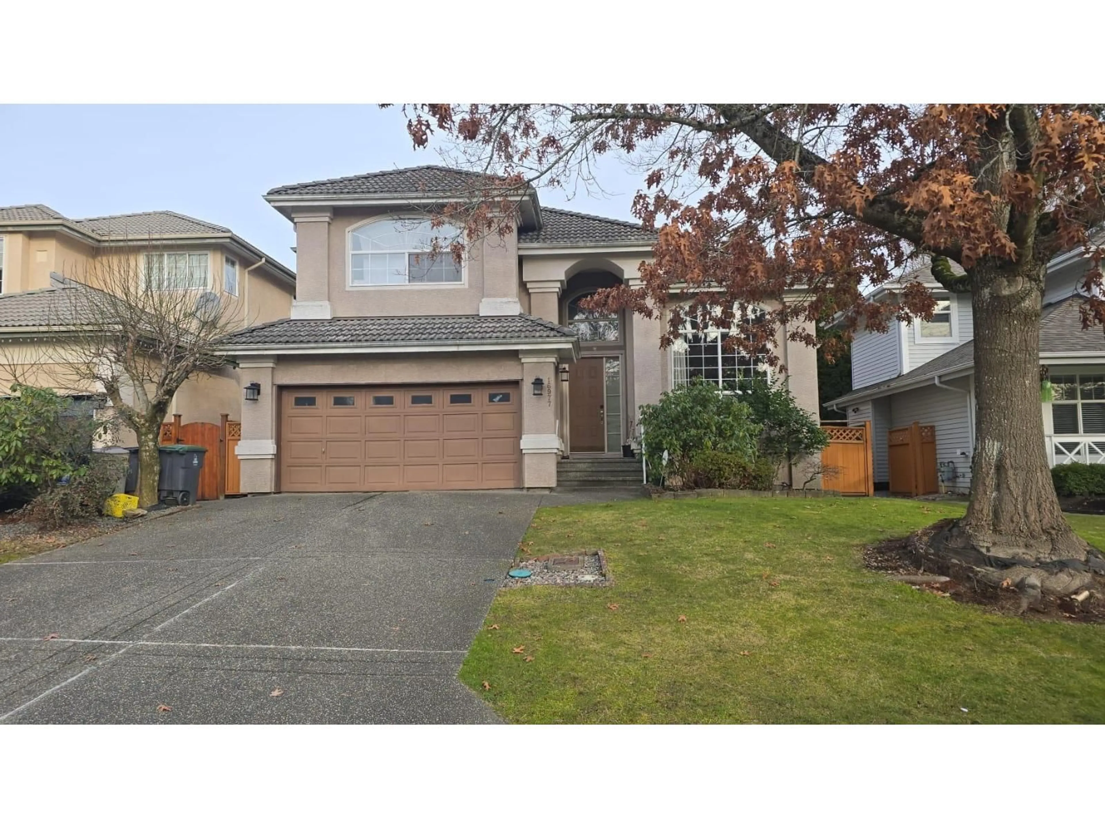 Home with vinyl exterior material, street for 16977 83A AVENUE, Surrey British Columbia V4N4V1
