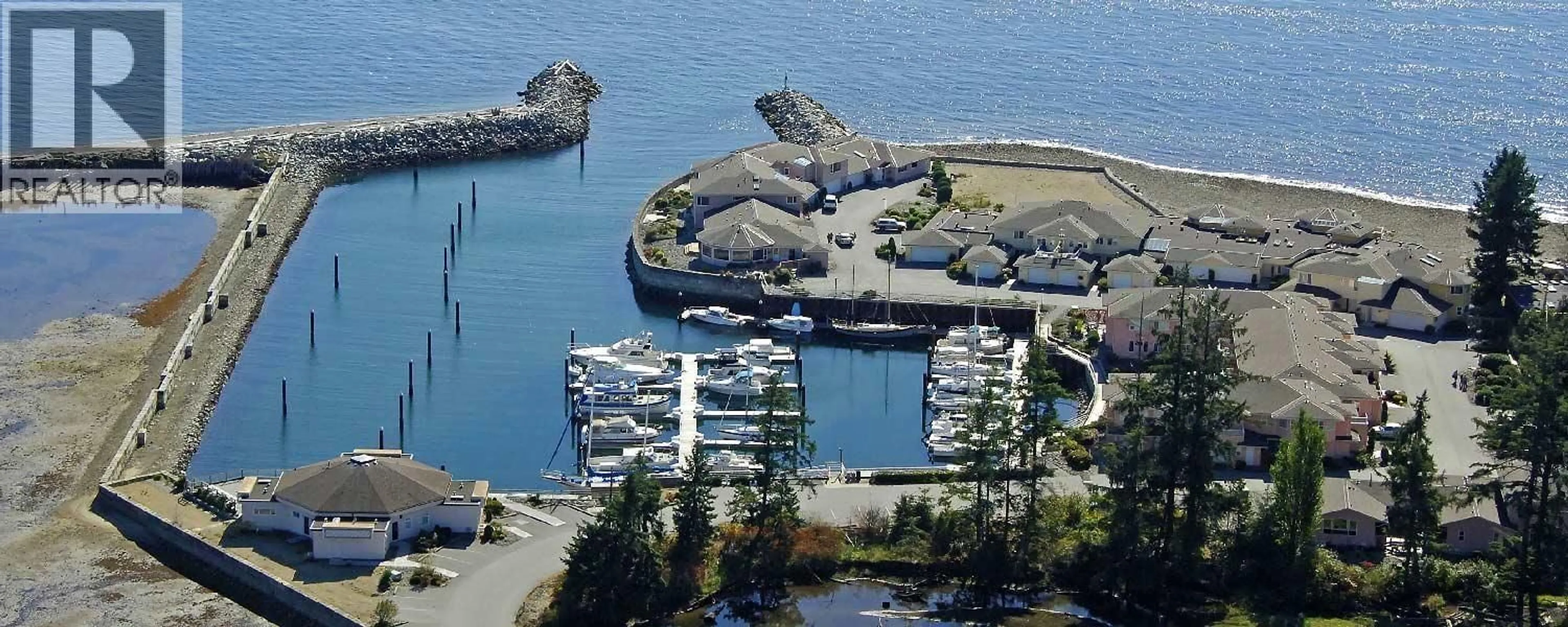 A pic from outside/outdoor area/front of a property/back of a property/a pic from drone, water/lake/river/ocean view for 226 - 1585 FIELD ROAD, Sechelt British Columbia V7Z0H1