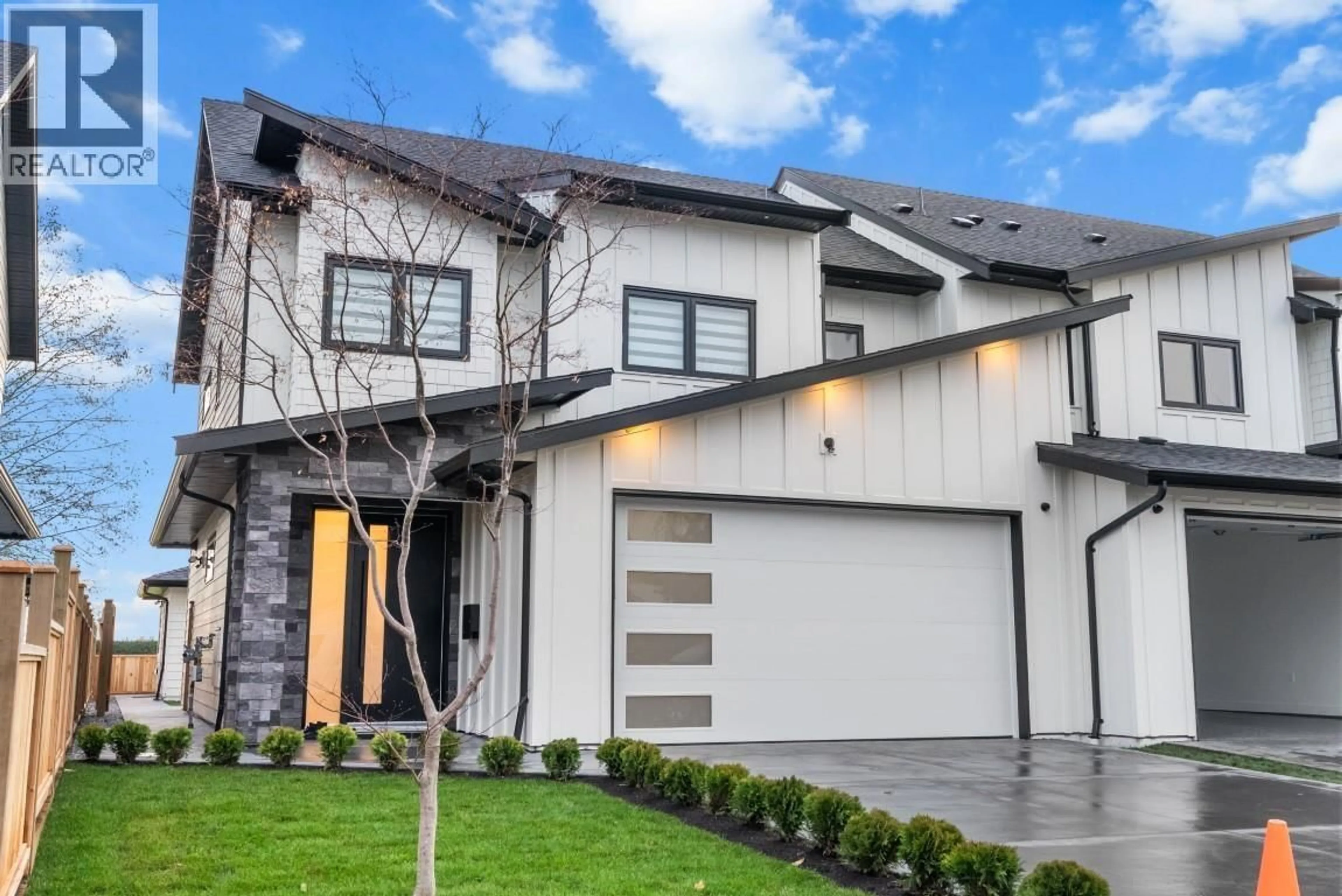 Home with vinyl exterior material, street for 4810 42A AVENUE, Ladner British Columbia V4K1A1