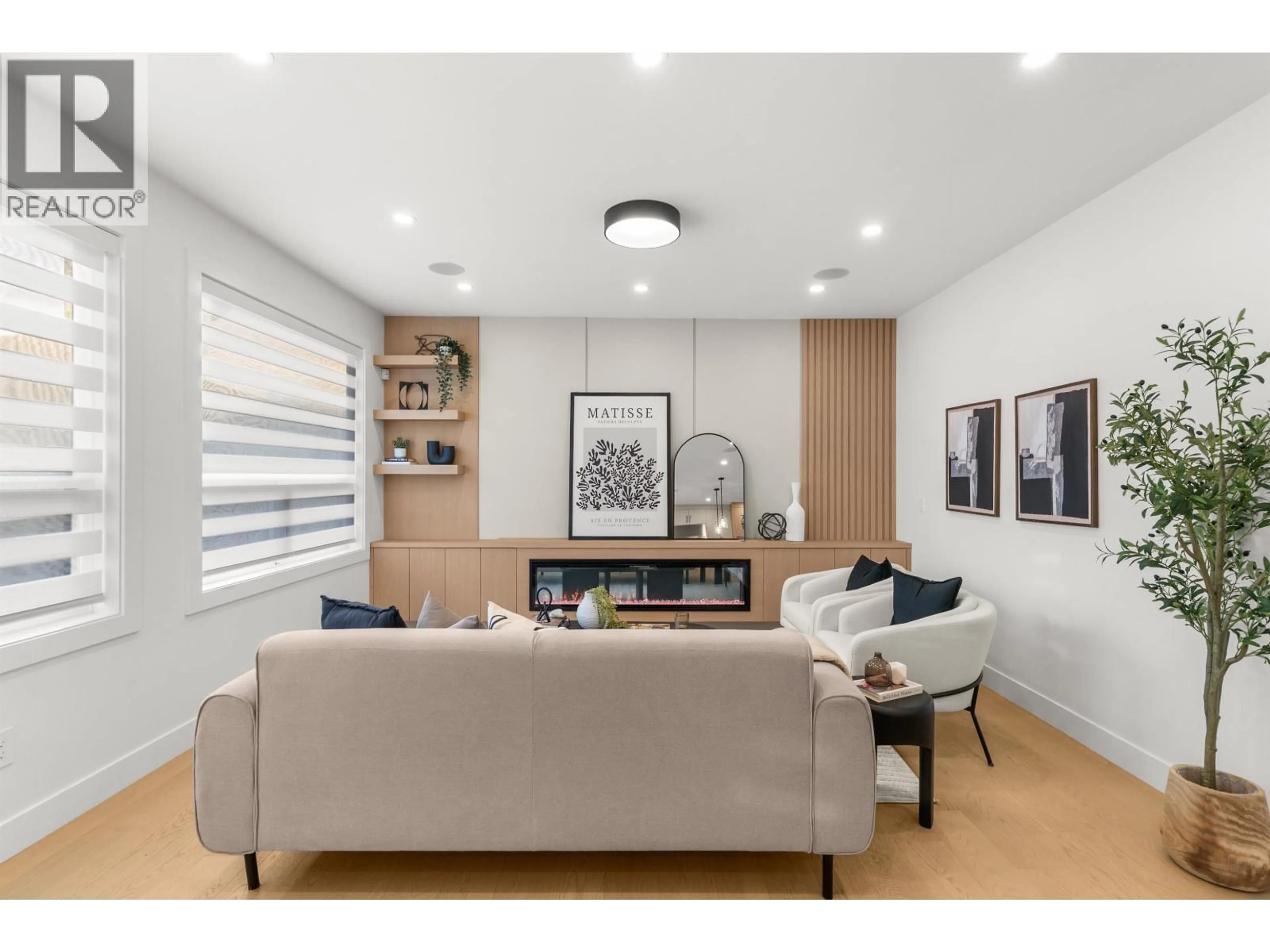 Living room with furniture, wood/laminate floor for 4810 42A AVENUE, Ladner British Columbia V4K1A1