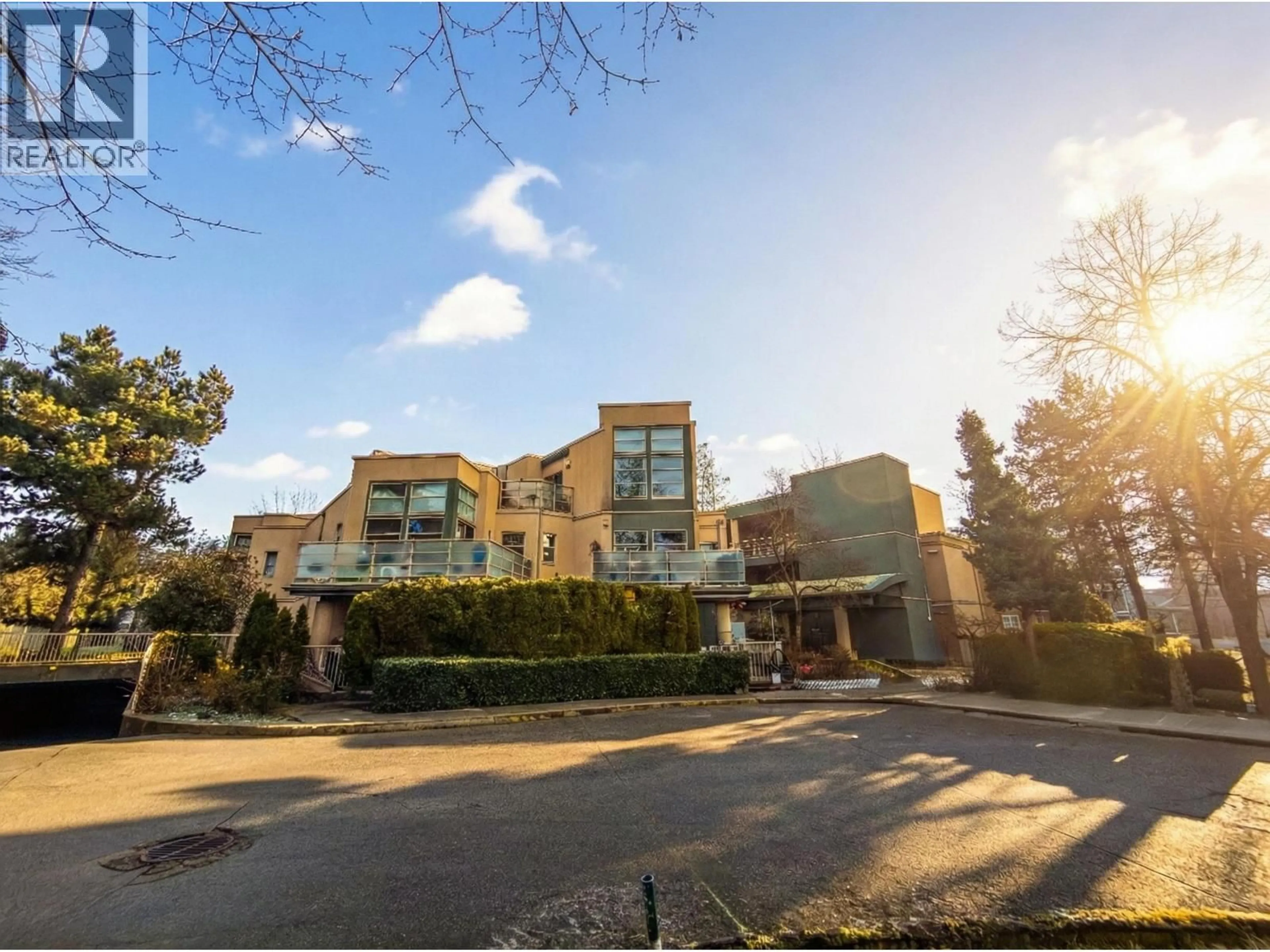 A pic from outside/outdoor area/front of a property/back of a property/a pic from drone, building for 101 - 22277 122 AVENUE, Maple Ridge British Columbia V2X3X8