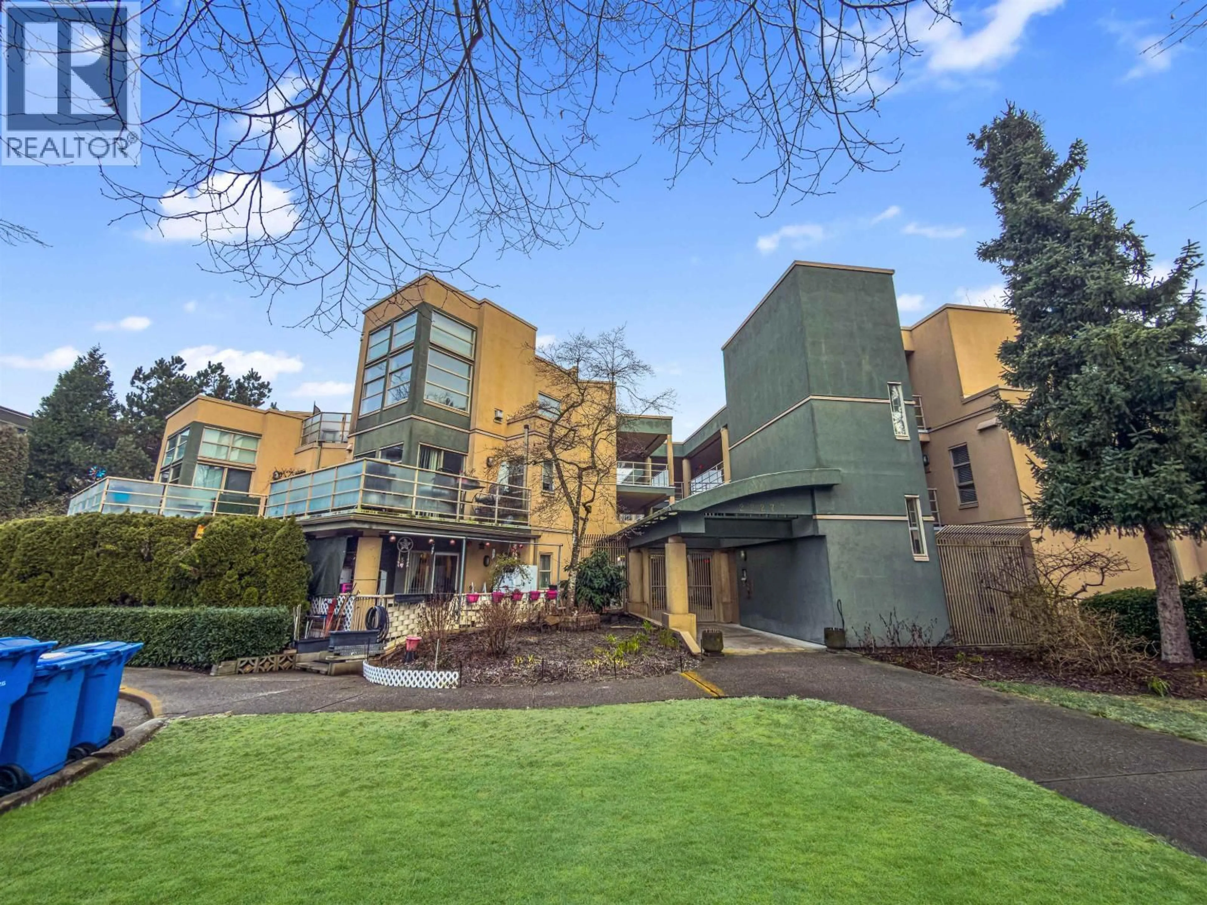 A pic from outside/outdoor area/front of a property/back of a property/a pic from drone, building for 101 - 22277 122 AVENUE, Maple Ridge British Columbia V2X3X8