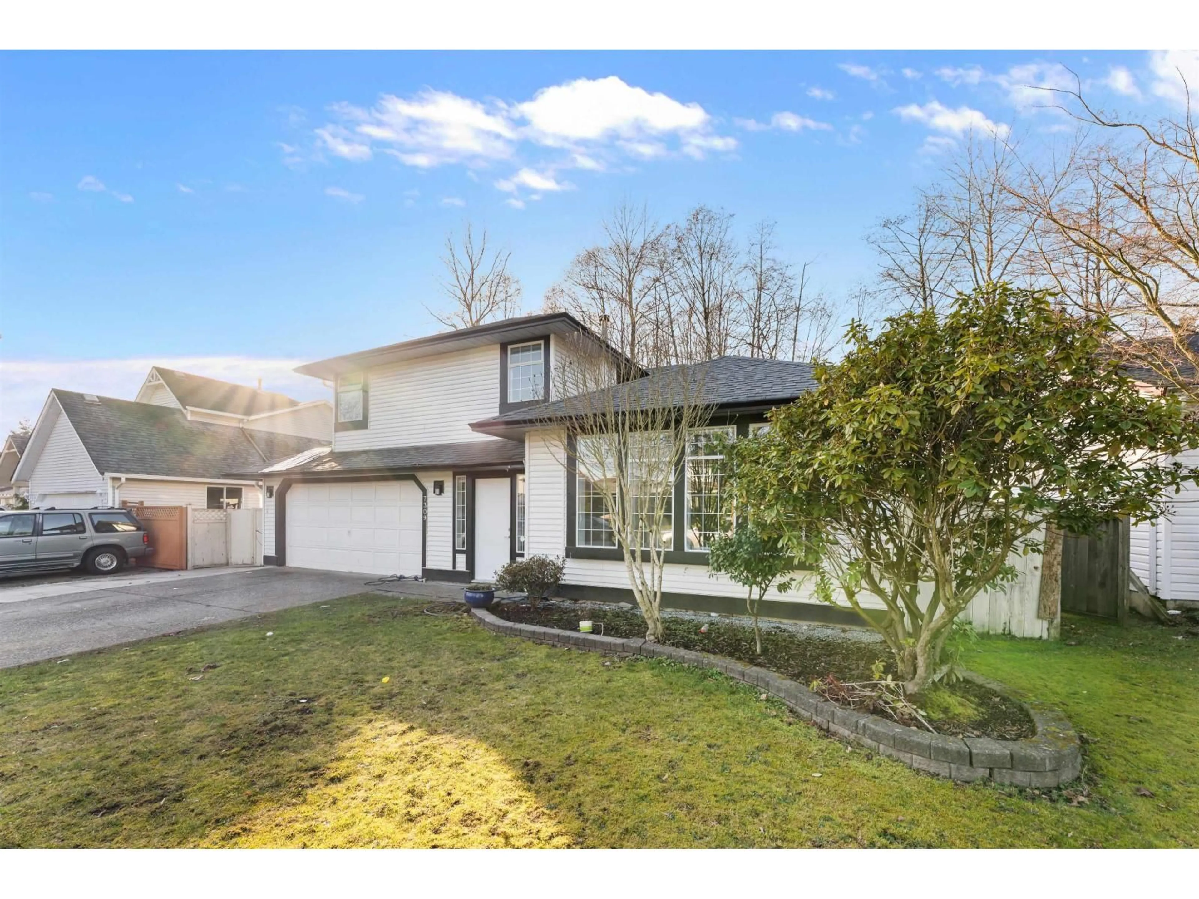 A pic from outside/outdoor area/front of a property/back of a property/a pic from drone, street for 7309 123 STREET, Surrey British Columbia V3W9J2