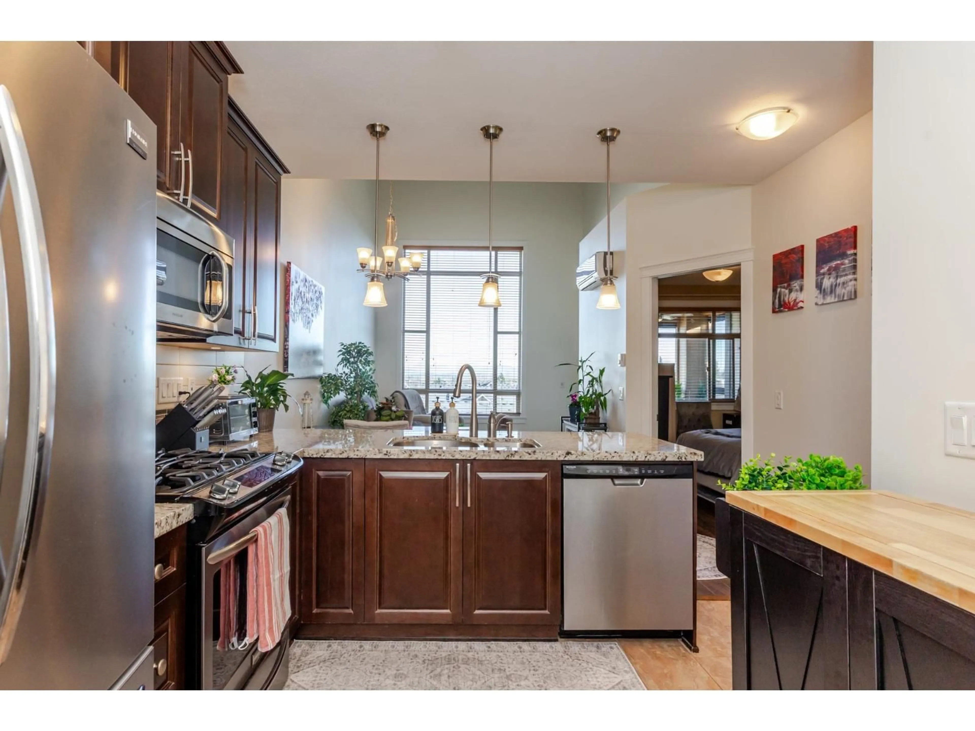 Open concept kitchen, ceramic/tile floor for 621 - 8067 207 STREET, Langley British Columbia V2Y0N9