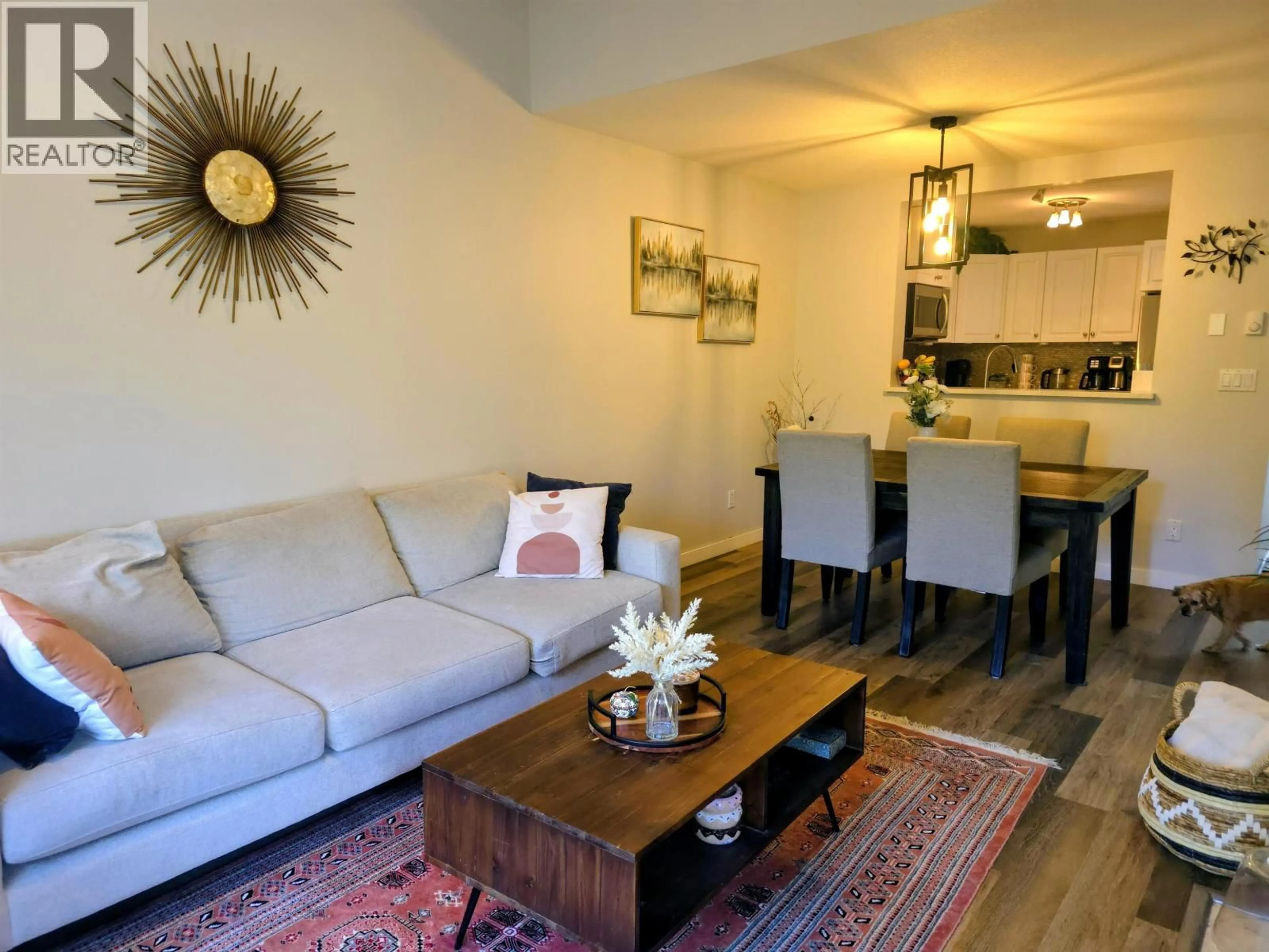 Living room with furniture, wood/laminate floor for 412 - 2960 PRINCESS CRESCENT, Coquitlam British Columbia V3B7P2