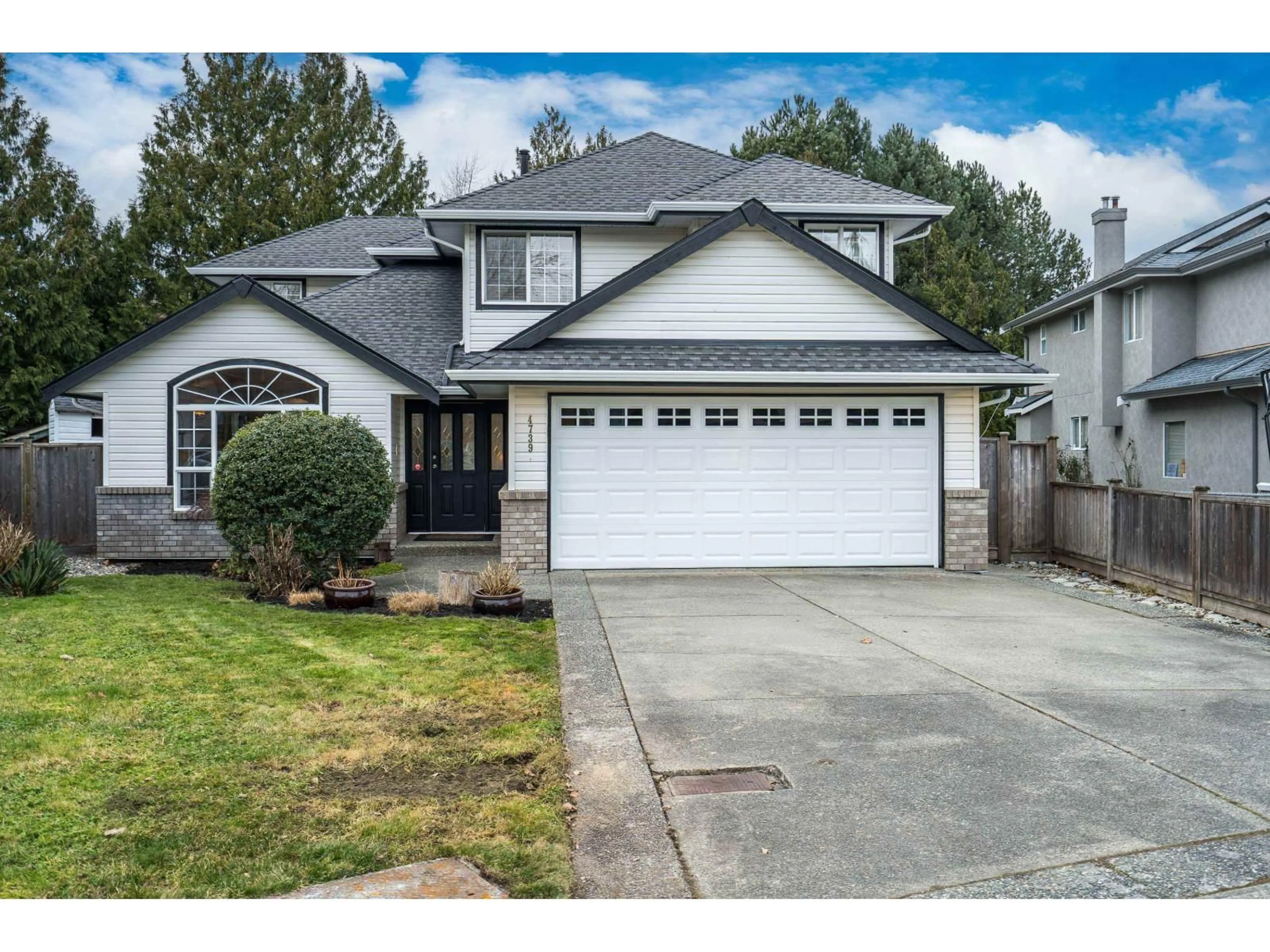 Home with vinyl exterior material, street for 4739 223 STREET, Langley British Columbia V2Z1M5