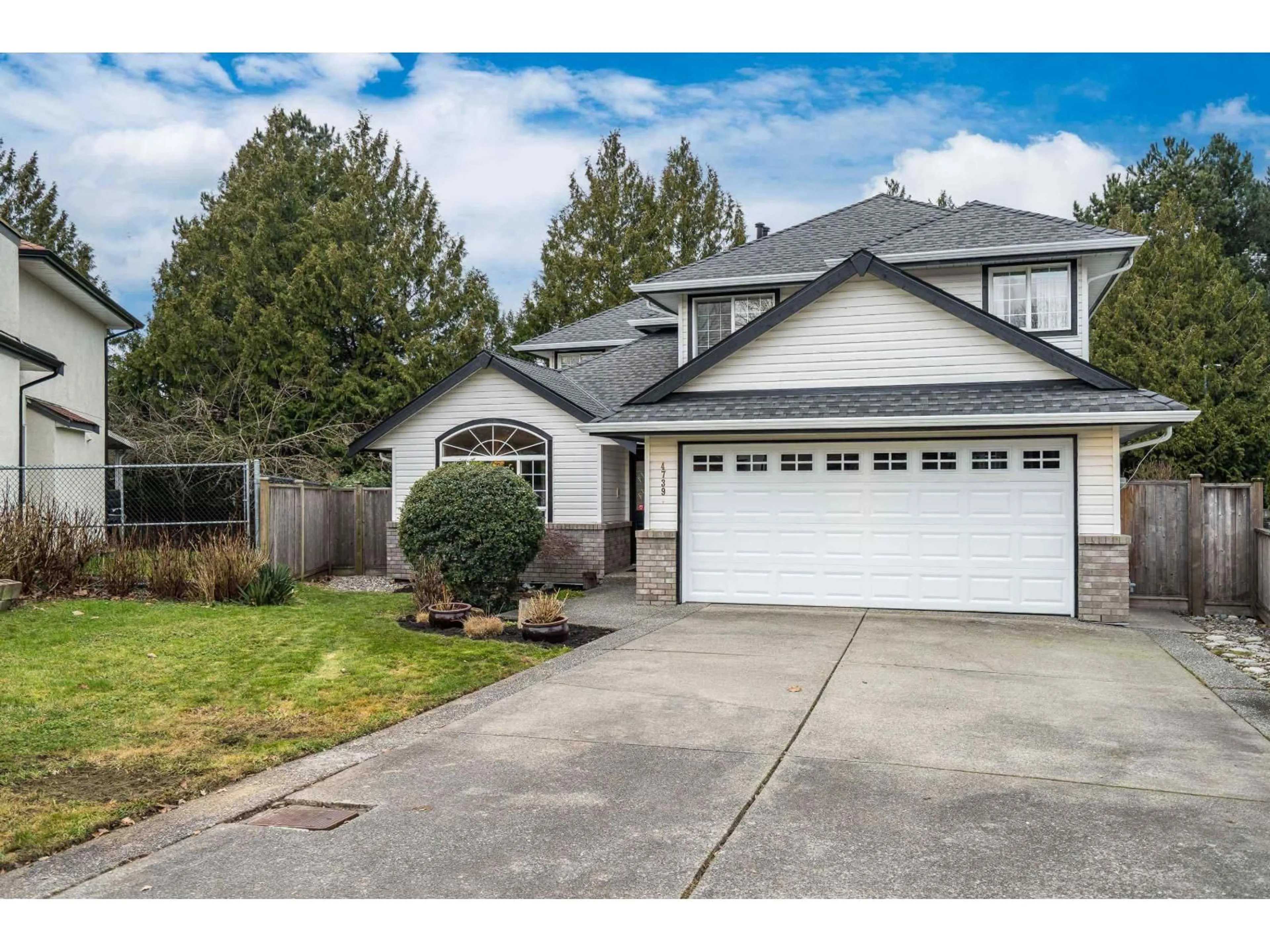 Home with vinyl exterior material, street for 4739 223 STREET, Langley British Columbia V2Z1M5