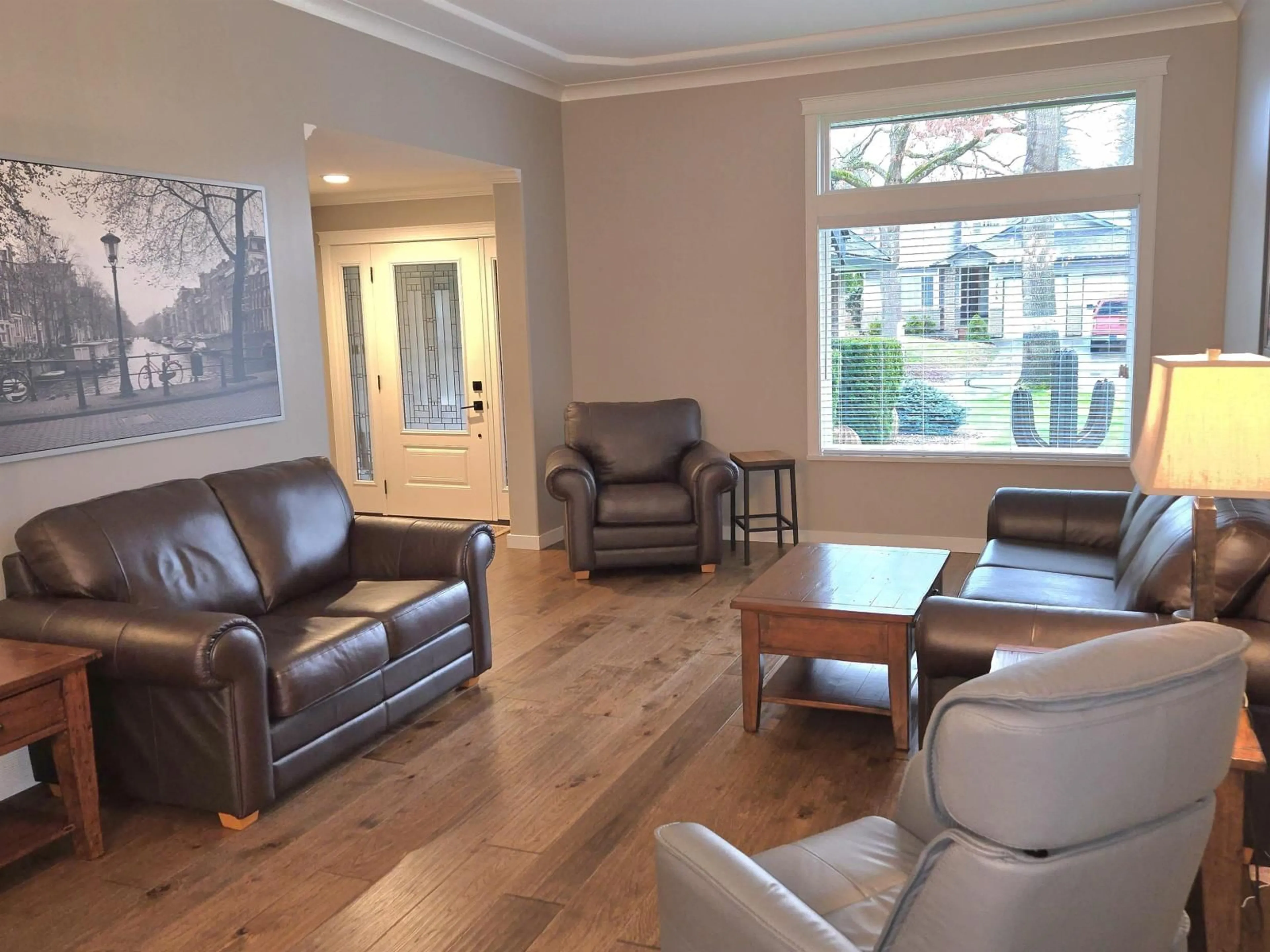 Living room with furniture, wood/laminate floor for 9749 206 STREET, Langley British Columbia V1M2H5