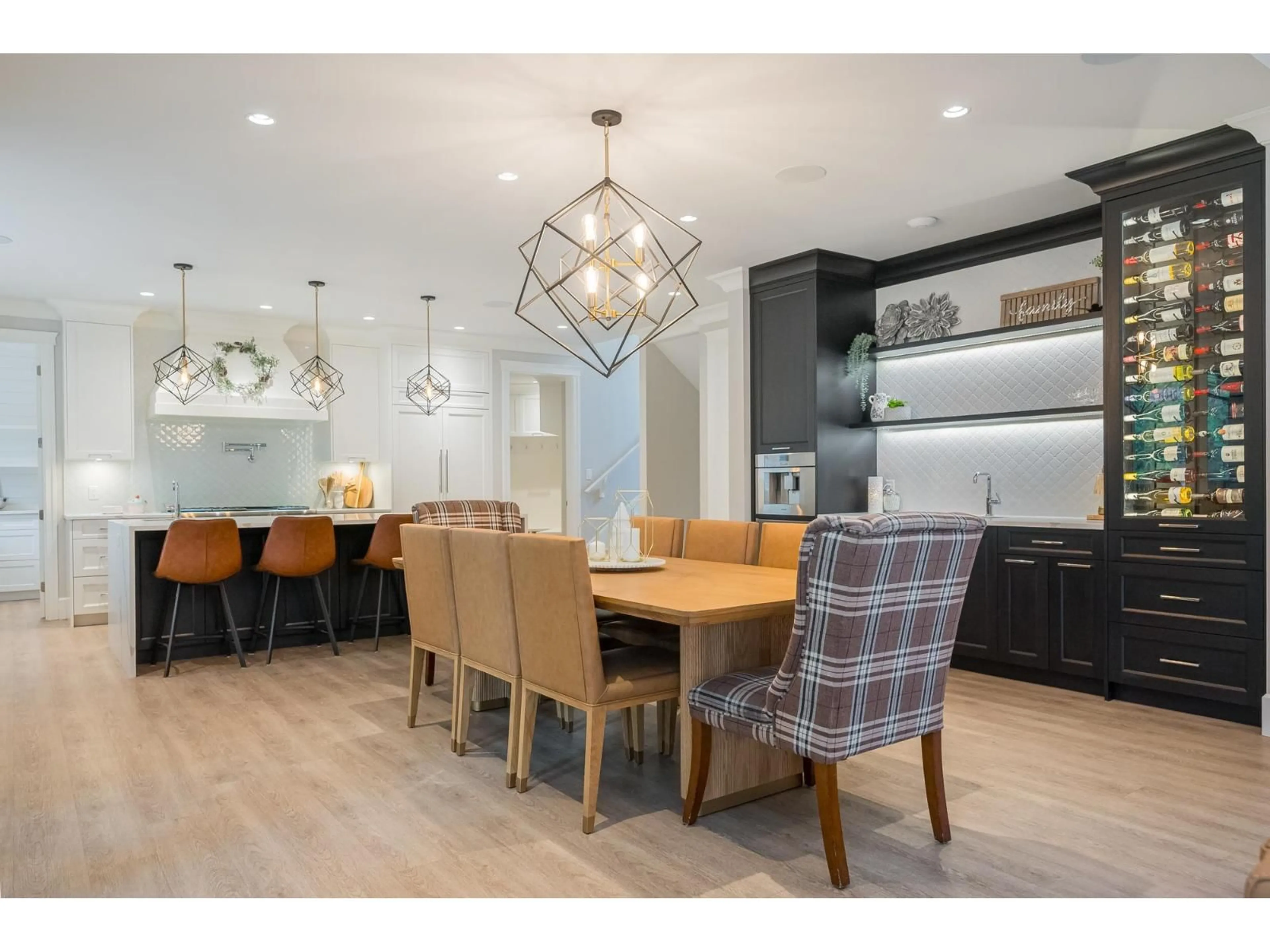 Open concept kitchen, wood/laminate floor for 26979 58 AVENUE, Langley British Columbia V4W1V6