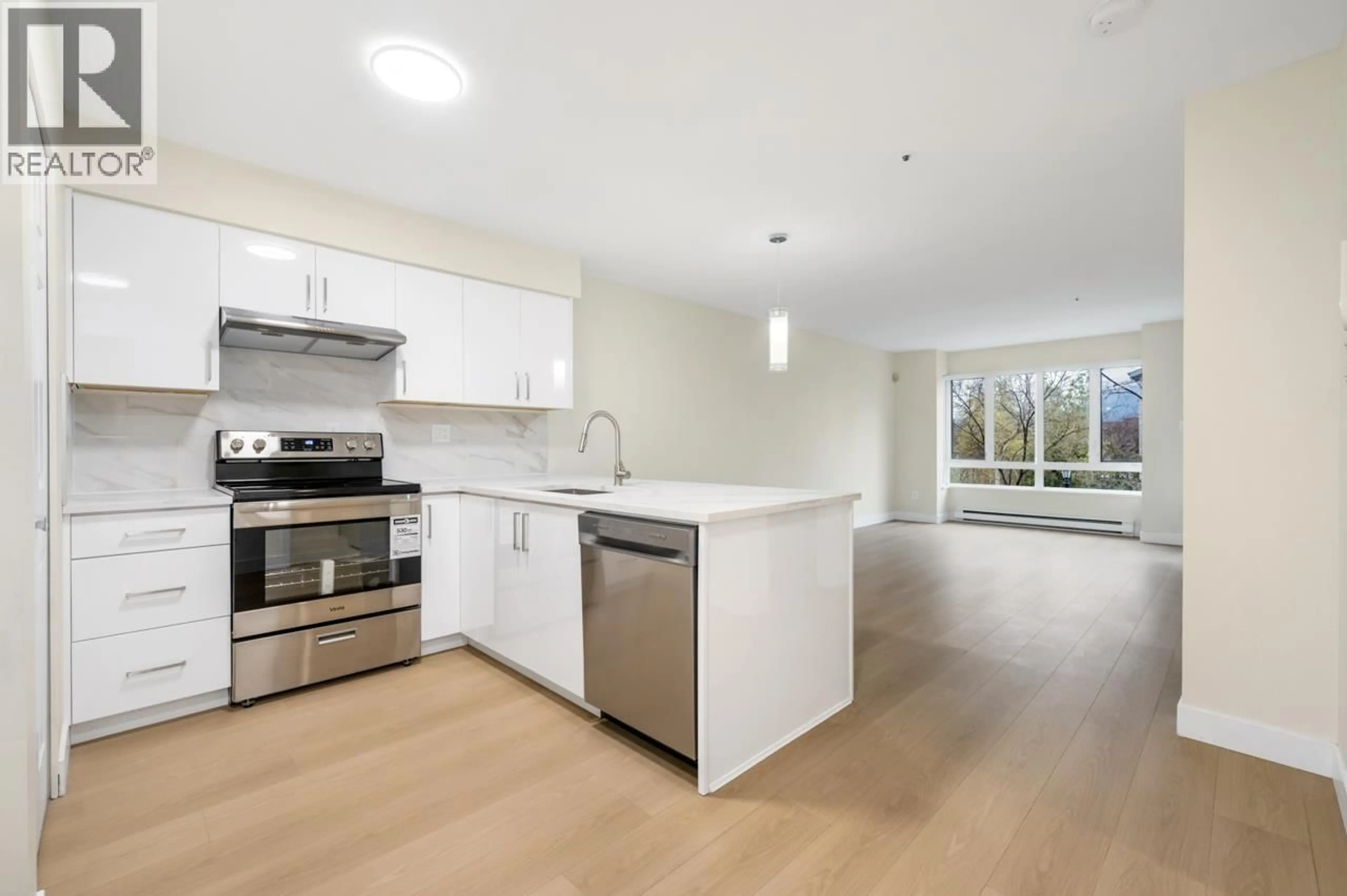 Open concept kitchen, unknown for 205 - 1823 GEORGIA STREET, Vancouver British Columbia V5L2B5