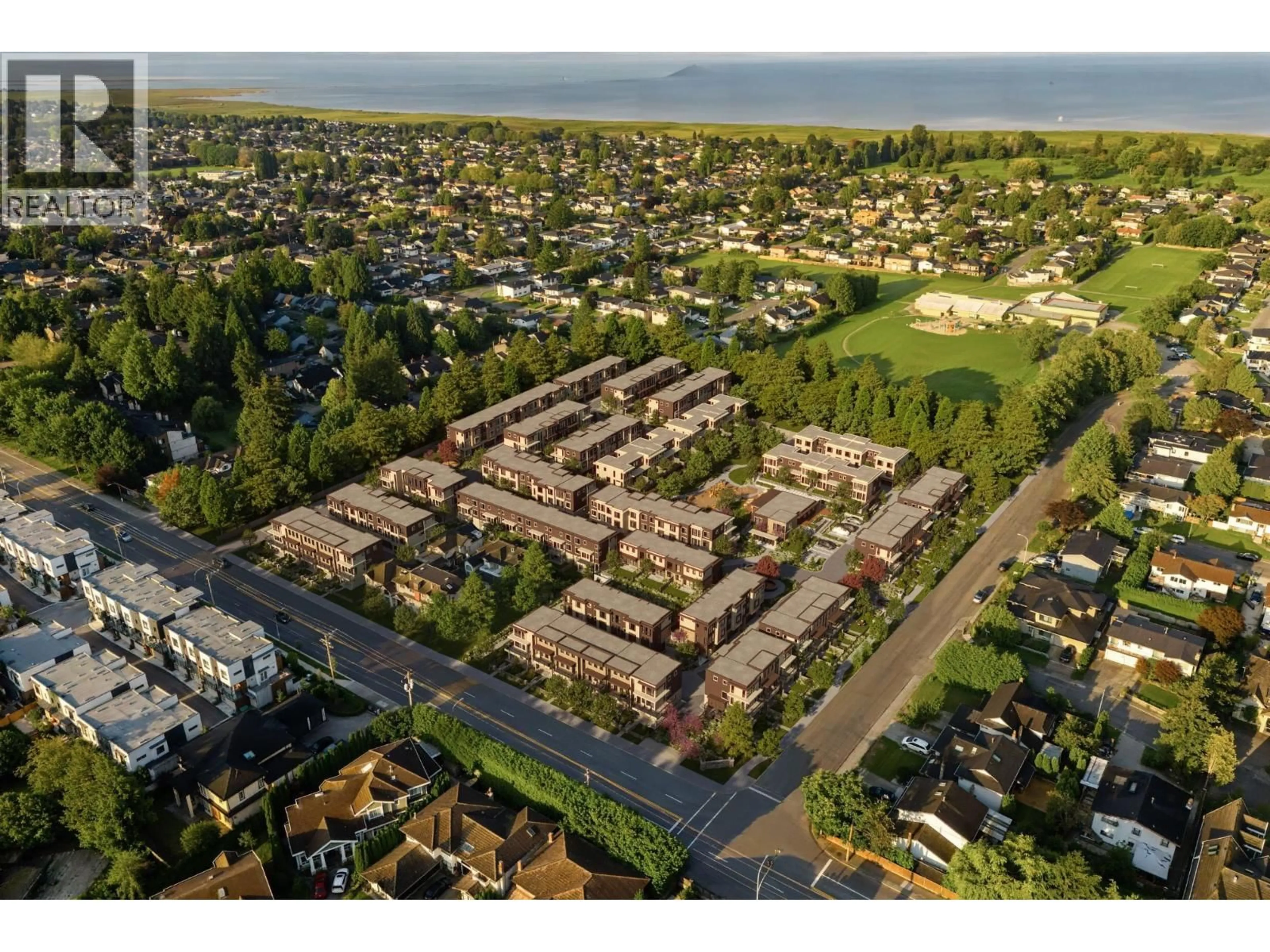 A pic from outside/outdoor area/front of a property/back of a property/a pic from drone, street for 10 - 3888 MORESBY DRIVE, Richmond British Columbia V7C4G6